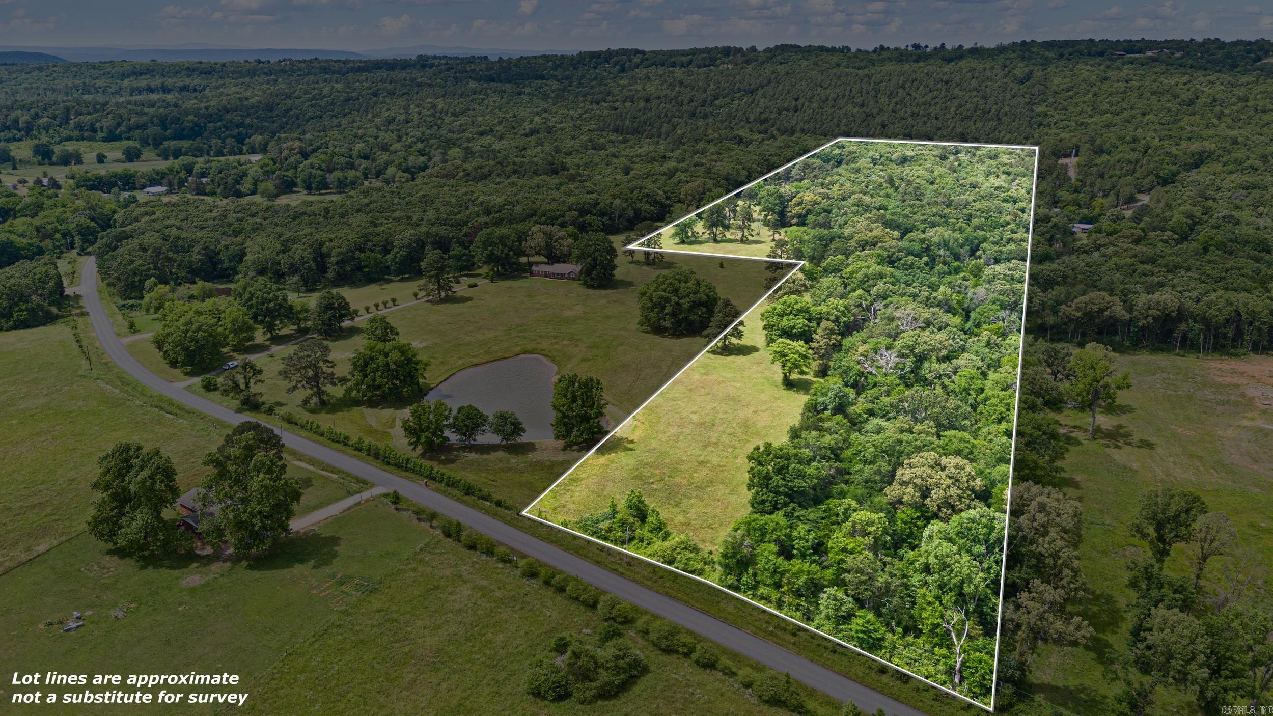 Come take a look at this beautiful 27.85 acre tract. Perfect for you to build your dream home or to keep for future plans. Only 10 minutes away from town and located in Russellville school district. The property to the left of this land is also for sale, 1114 W Gum Log Road. Contact us today for more information.