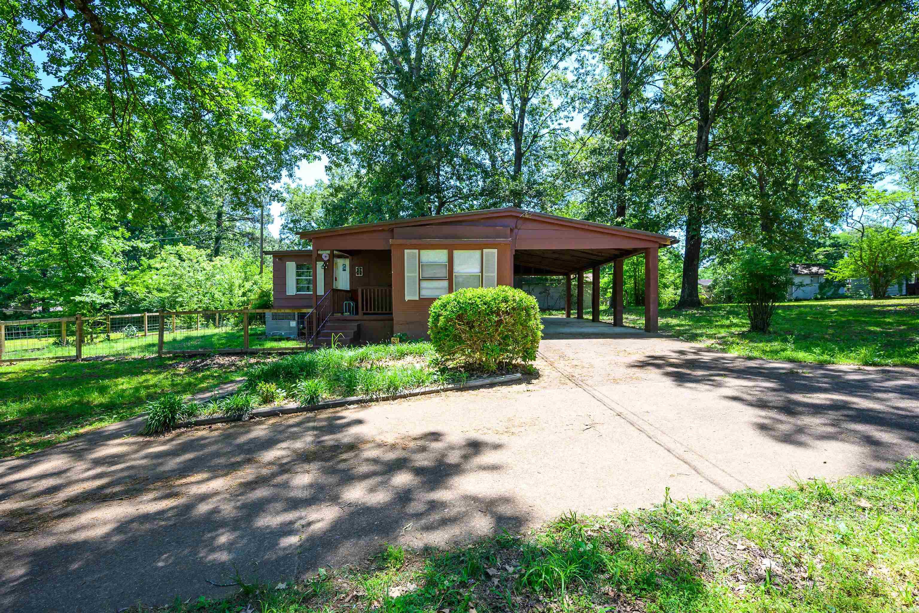 Affordable 2-bedroom, 2-bath mobile home located within Batesville city limits on a large, level lot featuring a circle driveway and approximately 480 sq. ft. carport. The property includes a fenced area ideal for pets or children and offers excellent potential as an investment or rental property. Recent updates include a new water heater, and the HVAC system has been regularly serviced and maintained, making this home move-in ready. Conveniently located just minutes from Batesville schools, shopping, dining, and other local amenities. Shown by appointment only. Call today to schedule your private showing.