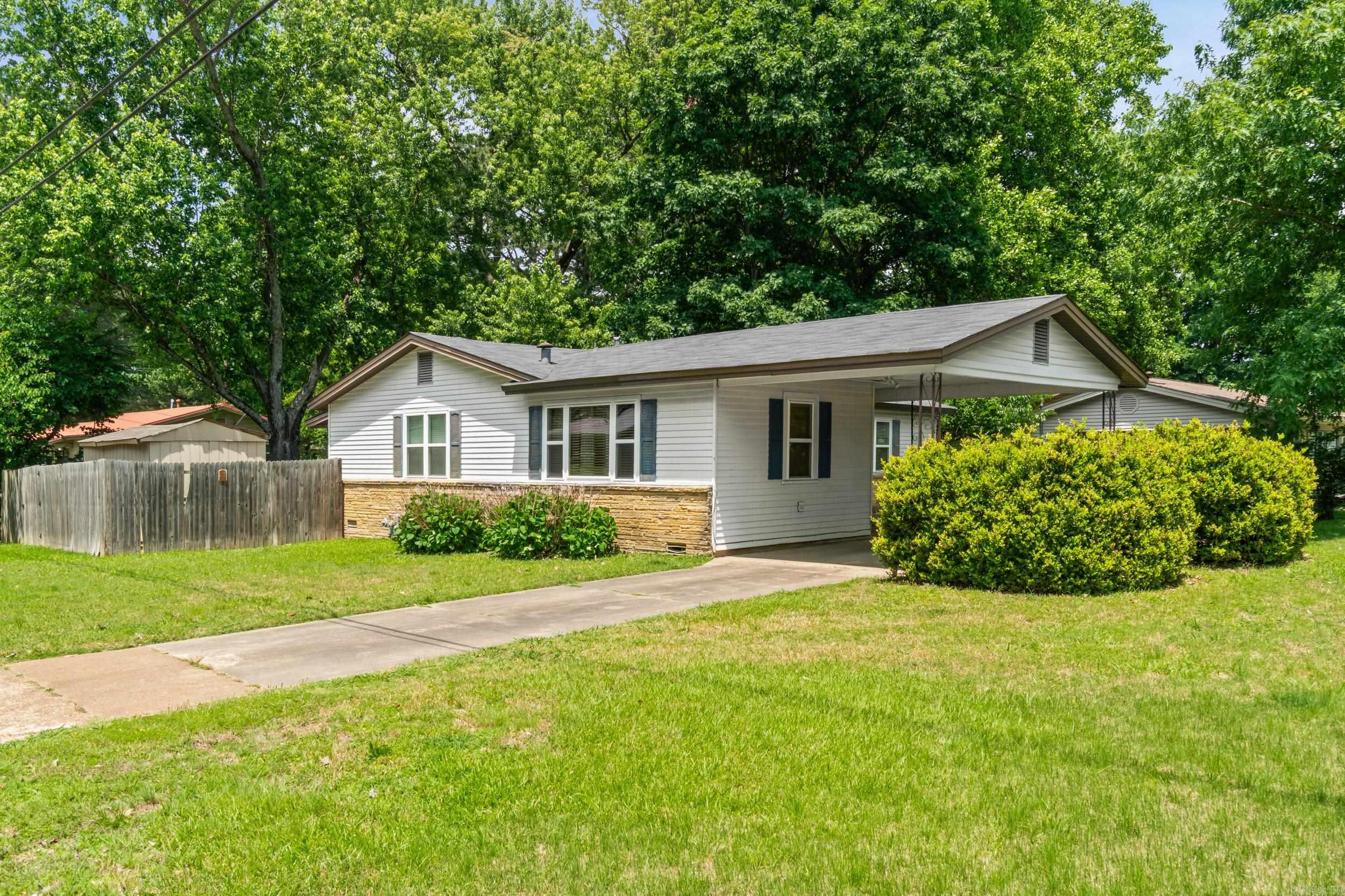 This home is tucked into a convenient spot close to everything Searcy has to offer. It has solid potential with new windows, a roof that’s only 5 years old, and plenty of opportunity to make it truly yours. The storage shed conveys with the property.