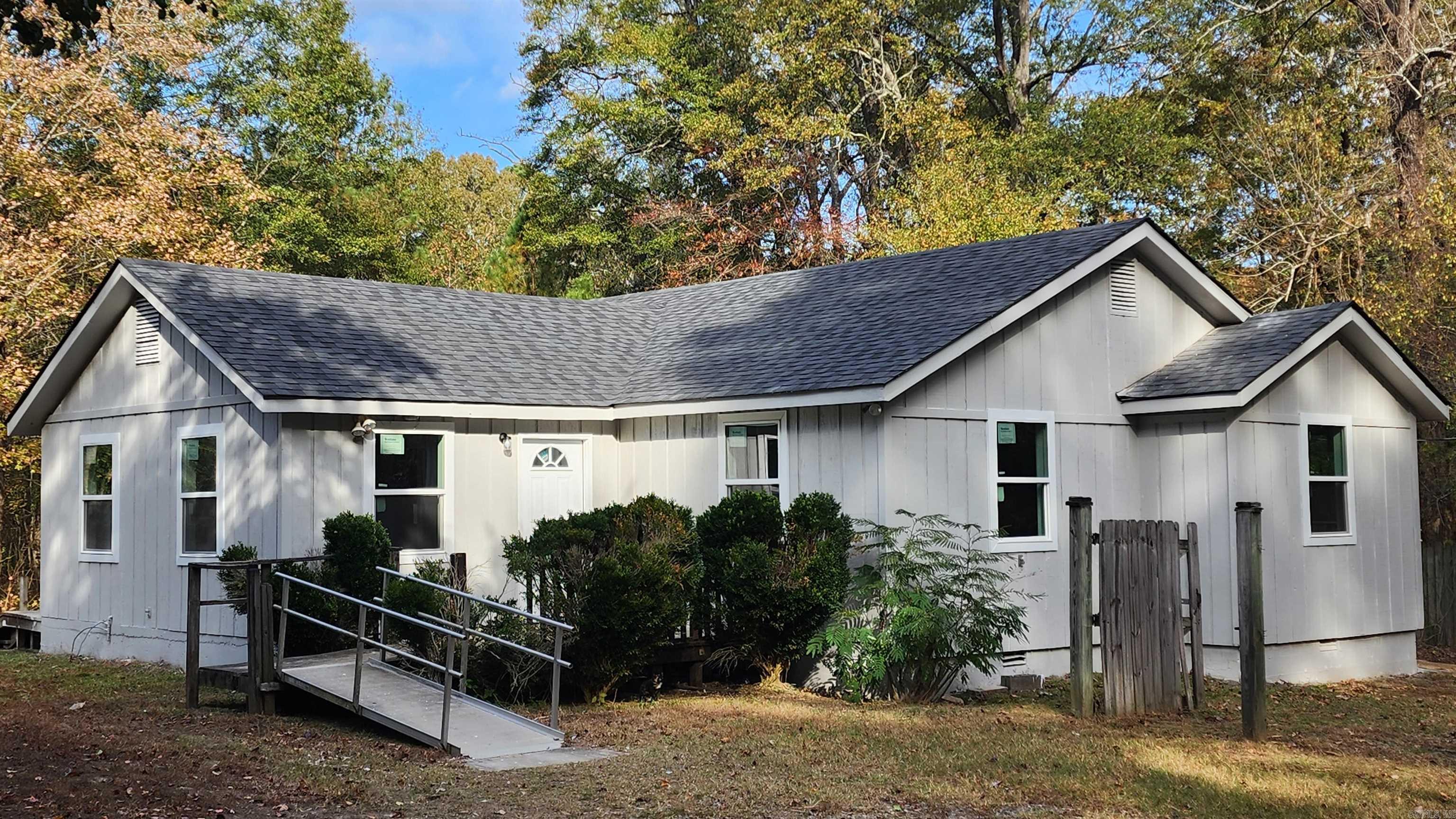 Recently remodeled, has new roof, floors, bathrooms, windows, freshly painted, granite counter tops. Sitting on an acre of land. 3 bedrooms 2 full bathrooms and a deck. Outside there 2 storage buildings that convey with property. Stop by if you like to have some outdoor space for cars, chickens or just some privacy. See showing remarks