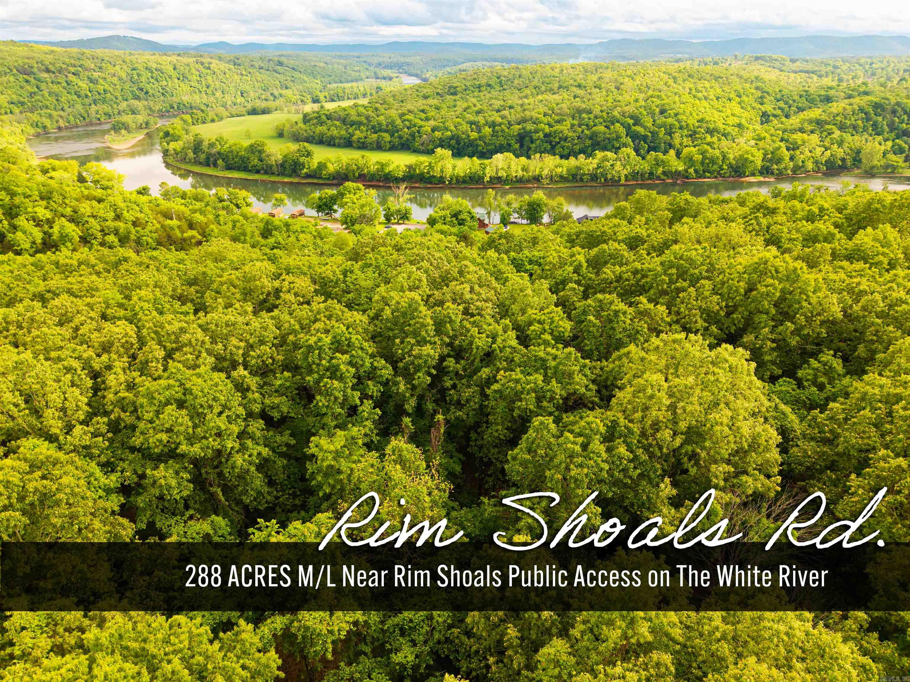 Discover 288 scenic acres just a short distance from the Rim Shoals access on the White River. The landscape features a natural swimming hole, a striking rock wall, and an established trail system. Jenkins Creek and Keeter Creek meander through the property. Abundant deer and turkey make this excellent hunting ground. With county road access, mature timber, and a cleared hay field, the property also offers practical usability and future potential. Whether you’re looking for a recreational retreat, hunting land, or an investment property, this tract presents a unique opportunity near the White River.