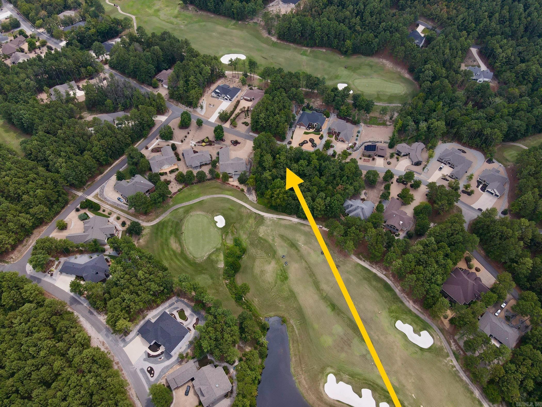 Granada Golf Course lot with gentle slope. Located near green of Hole #15. Come build your new golf front home in Hot Springs Village! It is home to 11 recreational lakes, nine championship golf courses, 13 tennis courts, 14 pickleball courts, 30 miles of walking trails, more than 200 clubs and organizations and numerous additional activities for all ages. Spanning 26,000 acres of the Ouachita Mountains, Hot Springs Village is the largest gated community inNorth America. New Member Buy-in Fee due at closing.