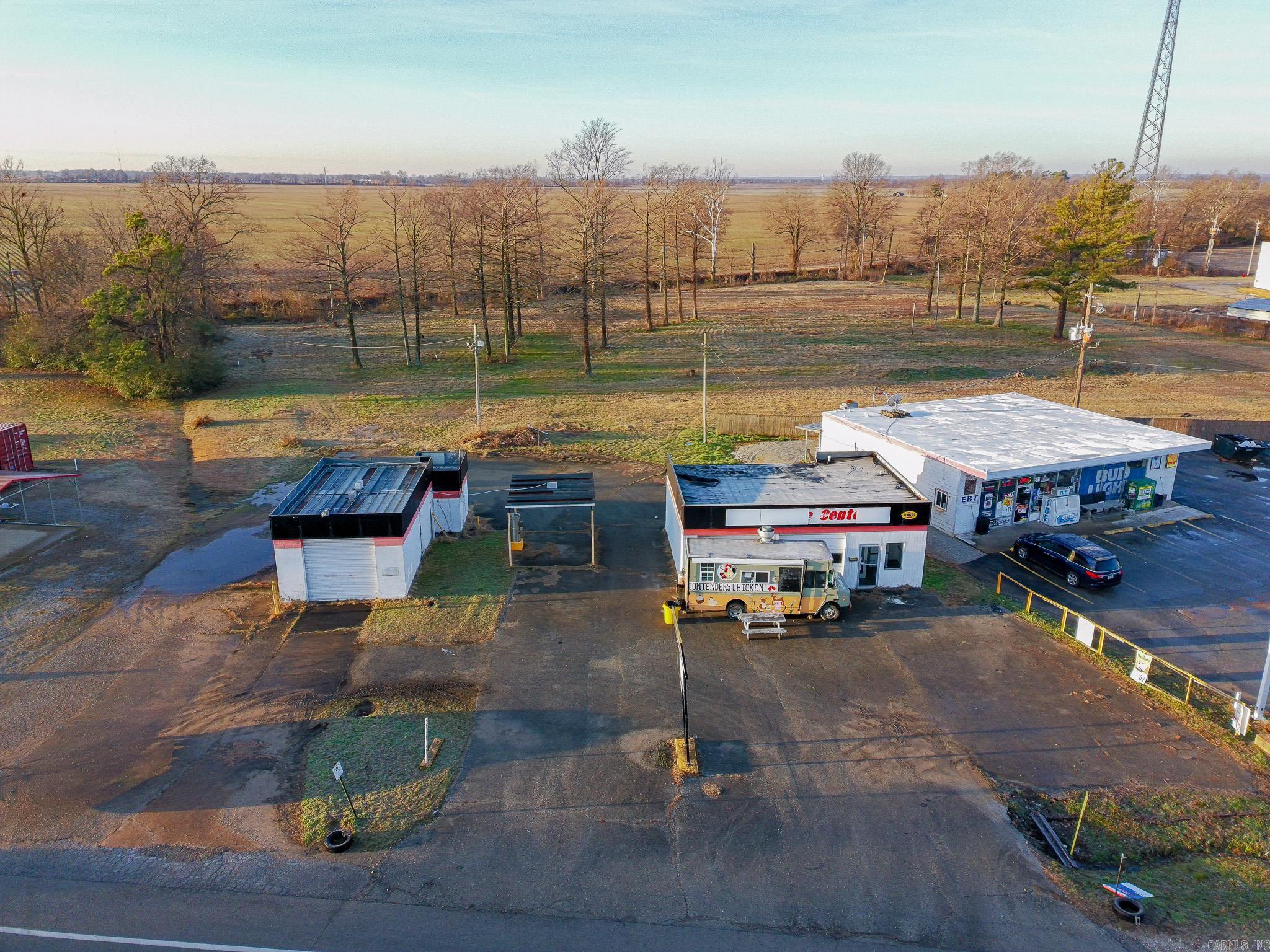 Two adjoining commercial properties along high-visibility South Highway 463 in Trumann. The 545 S Hwy 463 parcel features a 1,525 sq ft single-story commercial building ideal for office, retail, or service-based businesses. The neighboring 549 S Hwy 463 parcel offers 2.62 acres of commercial land previously used as a mobile home park, providing flexible redevelopment potential. Together, these properties create a rare opportunity for multi-use development, expansion, or investment along one of Trumann's primary commercial corridors.