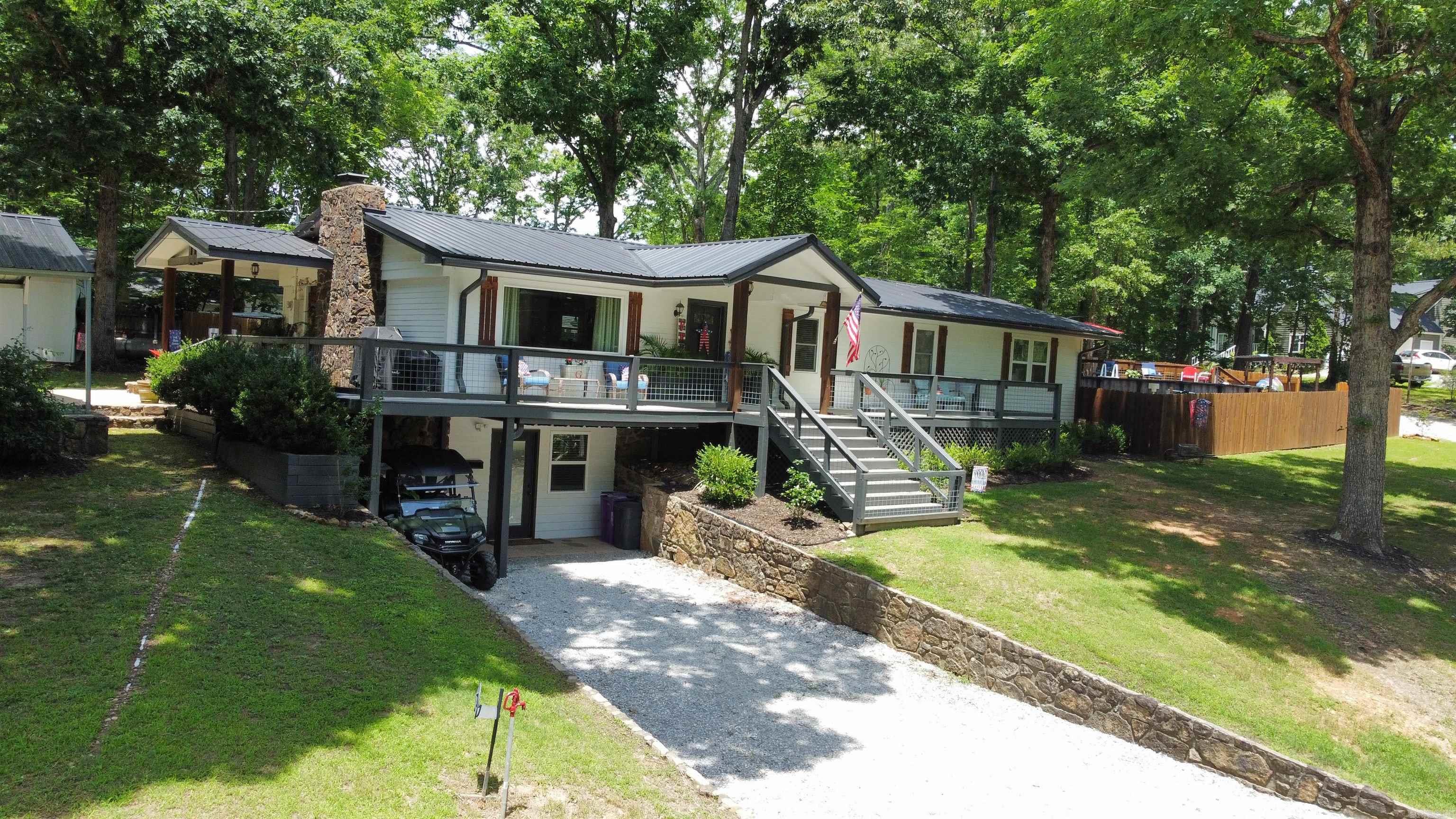 Welcome to this beautifully maintained and updated 3-bedroom, 2-bath home located in the heart of Mountain View, Arkansas. From the moment you arrive, you'll appreciate the pride of ownership and attention to detail throughout this move-in-ready property. Inside, you'll find a spacious and inviting floor plan with numerous updates that blend comfort and style. The finished basement offers excellent flexibility and would make a perfect bonus room, game room, home office, or additional living space to fit your needs. Step outside and enjoy your own backyard retreat featuring a refreshing swimming pool, ideal for entertaining family and friends or relaxing on warm Arkansas days. A small shop provides extra storage, workspace, or room for hobbies and projects. Conveniently located near all that Mountain View has to offer, this well-kept property combines modern updates, functional space, and outdoor amenities into one exceptional package. Whether you're looking for a full-time residence, weekend getaway, or investment opportunity, this home is one you won't want to miss!