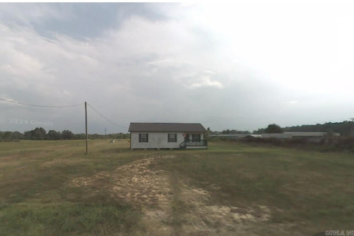 A full level acre. House is being sold "AS IS".