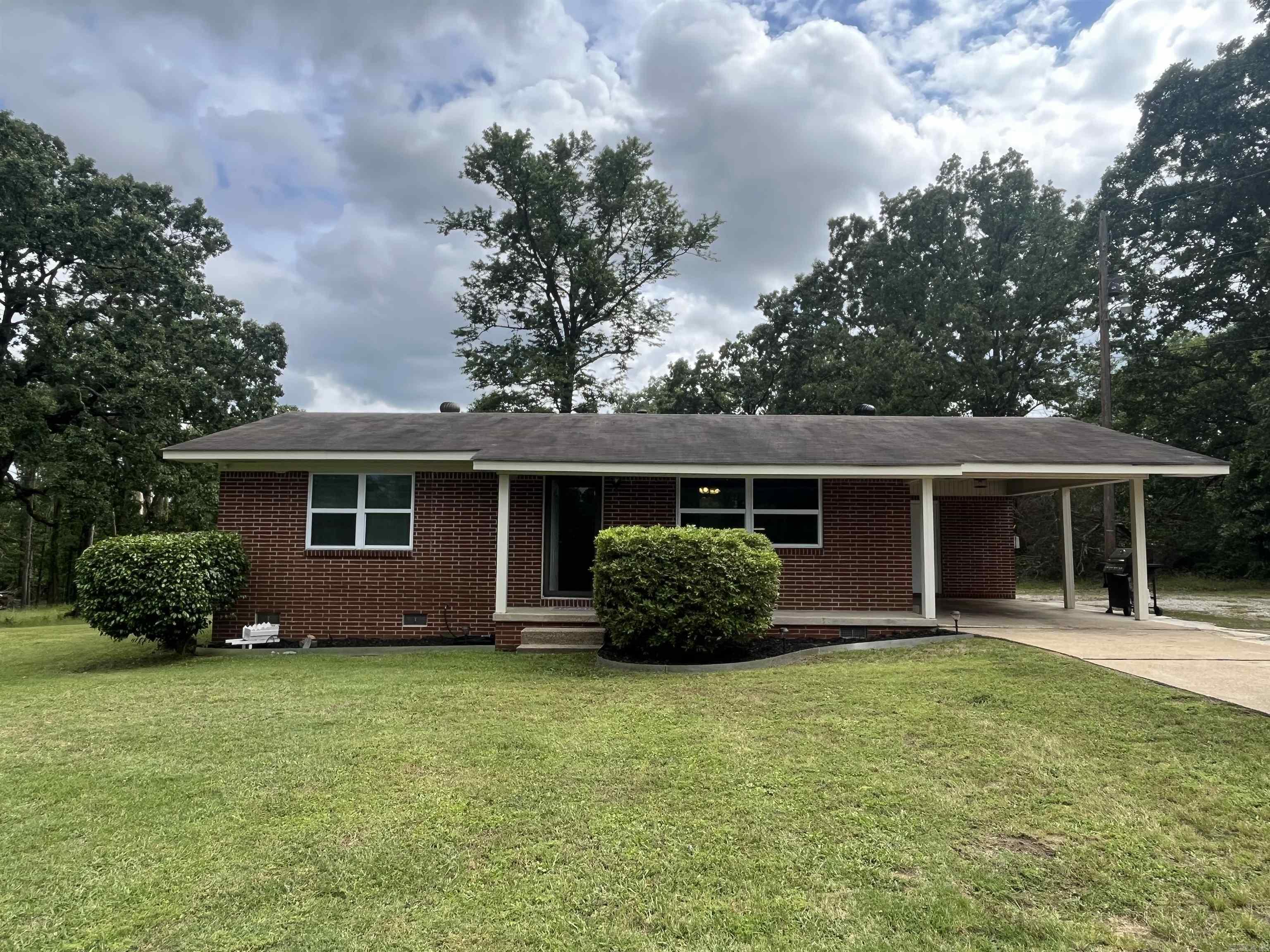 Take a look at this 2 bedroom 1 bath brick home in a fantastic location.  Tons of new updates have just been completed on this well maintained home including a new HVAC system.  You'll love the short 15 minute commute to Hot Springs, 3 minutes to Interstate 30 and 5 minutes from Walmart.  Take action on this remarkable updated home perfectly situated on over an acre of land.