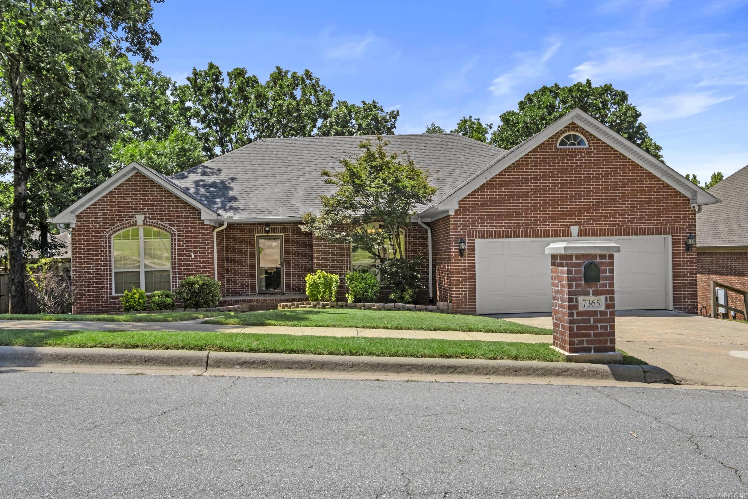 Welcome to this 3-bedroom, 2.5-bath home in Gap Creek Subdivision featuring a semi-open floor plan with the primary suite thoughtfully separated from the other two bedrooms for added privacy. A welcoming foyer leads into the spacious great room highlighted by a tray ceiling and wood-burning fireplace. Just off the great room, the kitchen and breakfast area offer plenty of cabinetry, granite tile countertops, a breakfast bar, stainless steel appliances, and a pantry. The generously sized primary suite includes a beautiful en-suite bath with double vanities, his and hers closets, a soaker tub, and a separate shower. Downstairs, the finished basement with its own private entrance and half bath provides endless possibilities as a man cave, game room, workshop, or in-law suite. Step outside and enjoy the private outdoor living spaces featuring a covered patio and an expansive deck that stretches across the back of the home. A brand-new roof installed in 2026 adds even more value and peace of mind. Don't let this one get away—schedule your showing today!