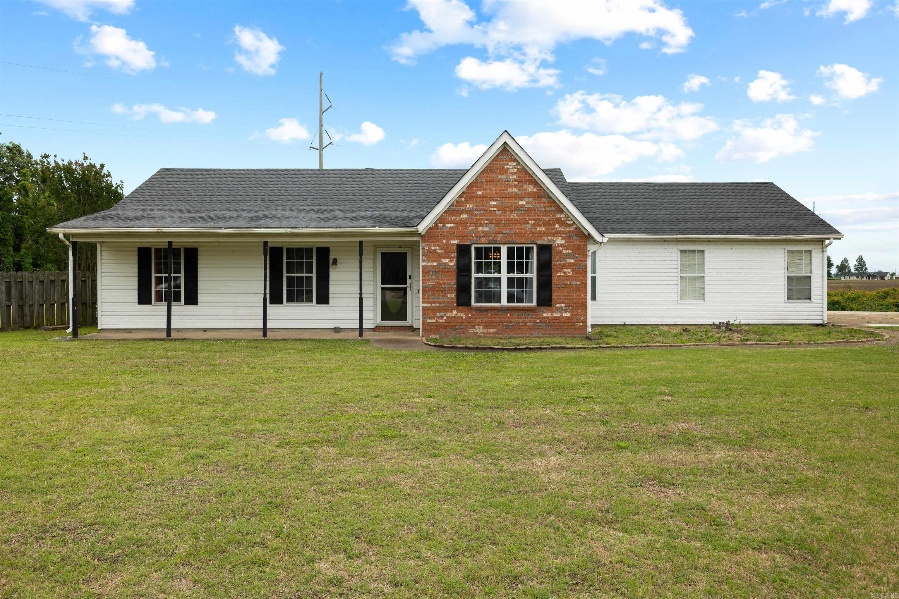 Beautifully updated 3 bedroom, 2 bathroom home located just outside the city limits of Trumann on approximately 1.08 acres. This home offers two spacious living areas, brand new flooring, fresh paint throughout, and a functional layout with plenty of room to spread out. The kitchen features ample cabinet and counter space along with a walk-in pantry for additional storage. The primary suite includes private access leading directly to the pool area. Outside you will find a 16x32 inground pool, currently covered, along with a large 30x40 shop offering endless possibilities for storage, hobbies, or workspace. Additional updates include a roof that is only 2 years old. This property combines space, updates, and outdoor amenities all in one convenient location.