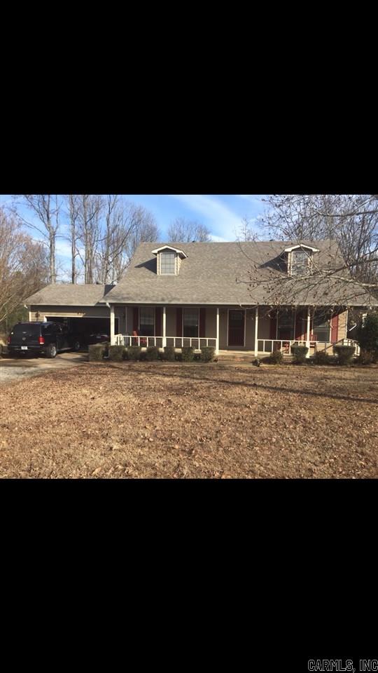 Beautiful Country Home that's move-in ready! Kitchen was updated 2013 with granite counter tops, all new stainless steel appliances,+ tile floors. Den has new paint, new flooring. All of downstairs has 9 ft. ceilings. New paint throughout, loaded w/ crown molding & trim, new carpets in upstairs bedrooms, heat & air package unit approx. 5 yrs., roof approx. 5 yrs. Enjoy the view of the land on the back deck. All this on1 acre! Just outside of city limits.JUST BEAUTIFUL!! Sq. Ft. approx. measuring encouraged.