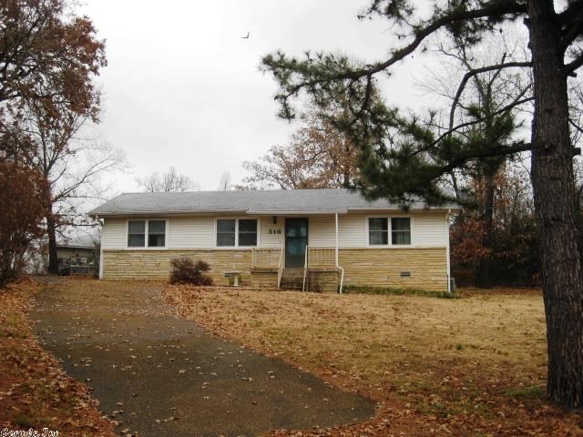 MOVE IN READY! 2 BD/2 BA could have a third bedroom. Living room, eat in kitchen, Family room, laundry and 2nd bath/mud room off the carport. Sunroom 13x16 at end of carport off kitchen. New kitchen cabinets with pull out drawers in the pantry and counter top in 2011. New kitchen flooring in 2013. New vinyl windows throughout except kitchen 2014.New water softener 2013.  Large bedrooms. Plenty of room in this house. Lot & Room dimensions are approximate and rounded down.