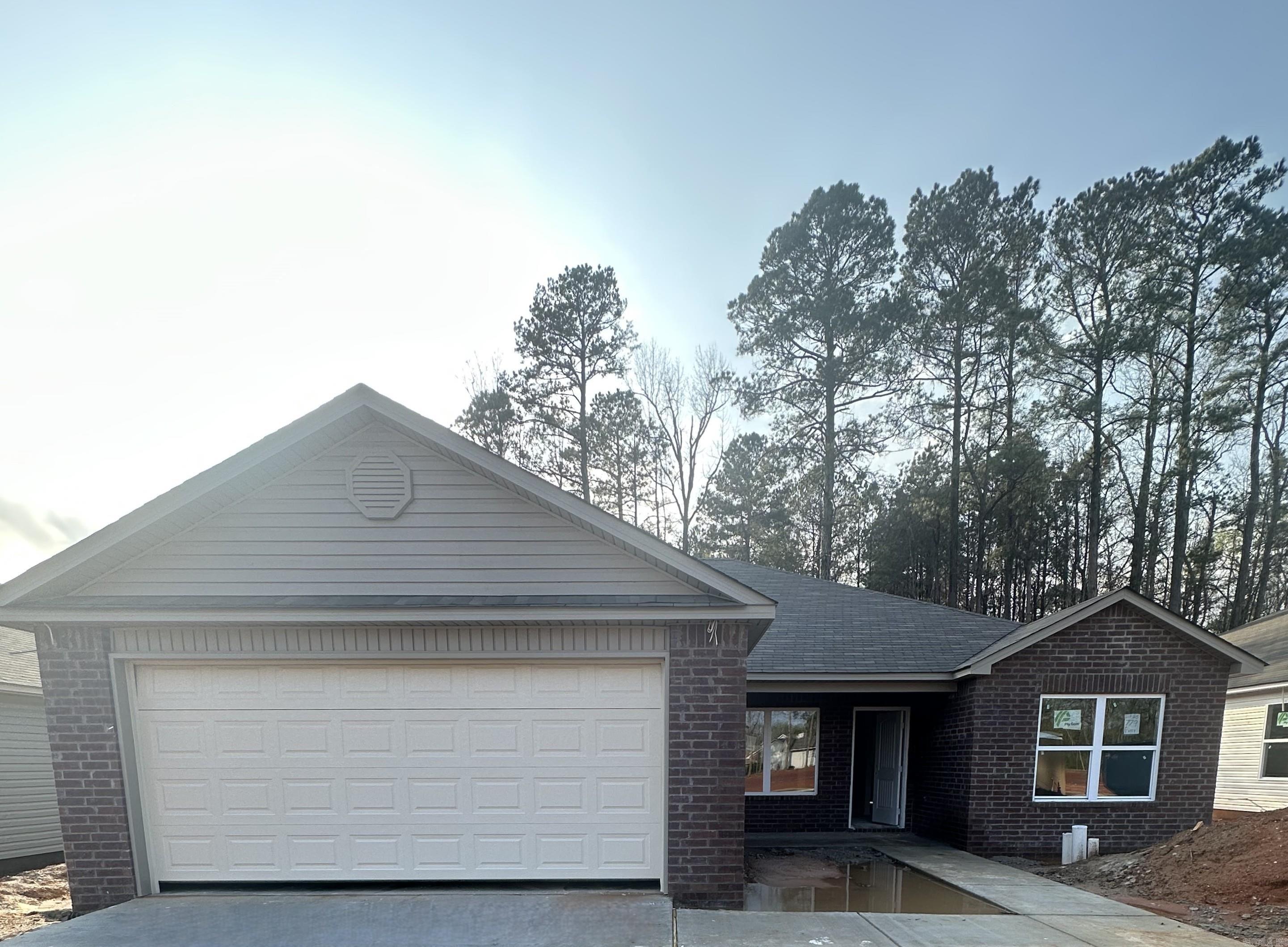 The gorgeous Lowell II plan is rich with curb appeal with its welcoming covered front porch and front yard landscaping. This home features an open floor plan with 3 bedrooms, 2 bathrooms, and an expansive living area. Also enjoy a flexible breakfast/dining area, and a beautiful kitchen fully equipped with energy-efficient appliances, ample counterspace, and a sizable pantry for the adventurous home chef. Learn more about this home today!   **SEE SHOWING REMARKS & AGENT REMARKS FOR IMPORTANT INFORMATION**