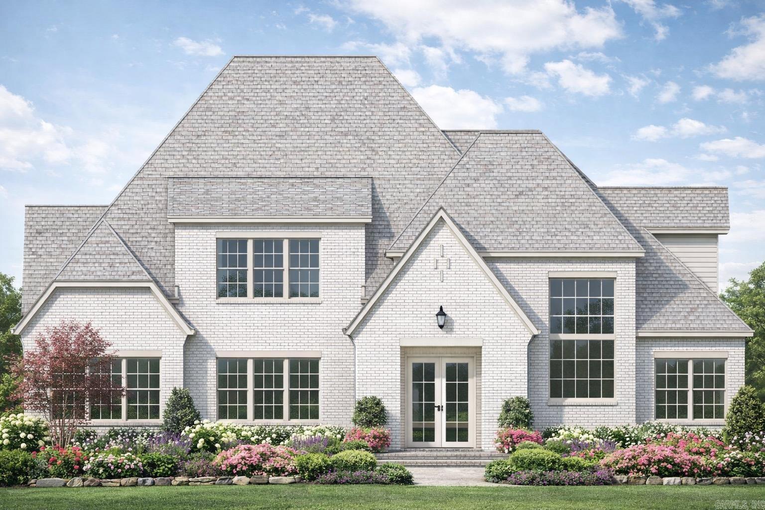 Rare new construction behind the future gates of Chenal’s final country club golf course community. Set on a premier corner lot with a peek-a-boo view of Bear Den #13 tee box, this 5BR/5BA, 4,500 sq ft home blends bold design with effortless livability. The main level offers 10-ft ceilings, a vaulted kitchen, hardwood floors, and a gas linear fireplace with custom tile. An open living, dining, and kitchen layout is ideal for entertaining, featuring quartzite countertops, 60-inch refrigerator, gas range, double ovens, oversized island, custom cabinetry, and a working butler’s pantry. Sightlines extend to the oversized covered patio and backyard. Two primary suites on the main level provide flexibility for guests or multi-generational living. The main primary includes a spa bath with soaking tub, walk-in shower, dual vanities, and built-in closet. An additional bedroom and private office complete the main level. Outdoor living features a covered patio with brick fireplace, tongue-and-groove ceiling, TV readiness, and space for an outdoor kitchen. Flat 0.36-acre lot is pool-ready. Upstairs offers two en-suite bedrooms and a Home Theater.  Estimated completion November 2026!