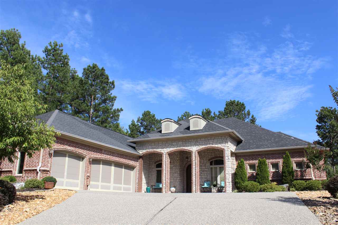 The moment you enter this one of a kind 3 bedroom, 2.5 bath home, you'll know you've found the one. Offering you your own private study, fireplace, top notch kitchen and appliances, world class construction, attention to details, and of course, the outstanding golf and lake views from your front and back porch, lake views out the front! This home is also available furnished!