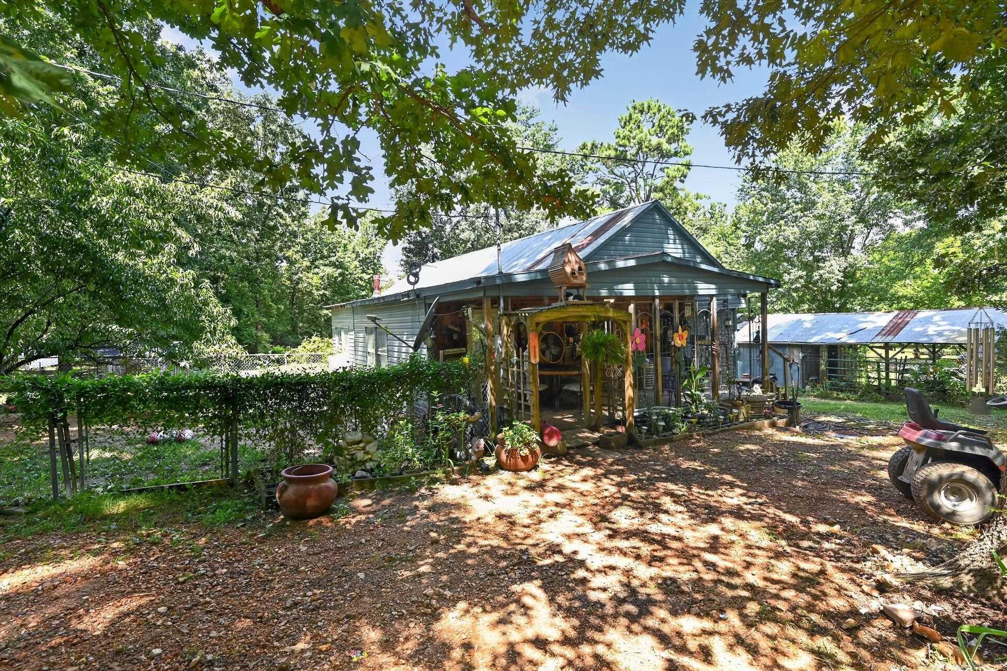 CNestled in the peaceful countryside, 320 Finney Rd, Batesville, AR 72501 offers the perfect blend of privacy, nature, and rural charm. This 3-bedroom, 1-bathroom home is surrounded by beautiful mature trees, creating a tranquil setting where you can enjoy frequent visits from deer, squirrels, and other wildlife right from your own yard.  The property also features a small shop, providing the perfect space for hobbies, storage, or weekend projects, along with a storm cellar for added peace of mind during Arkansas weather.  Whether you're looking for a quiet place to call home, a weekend retreat, or a property with room to enjoy the outdoors, this home offers a unique opportunity to embrace country living while still being conveniently located near Batesville's shopping, dining and amenities.