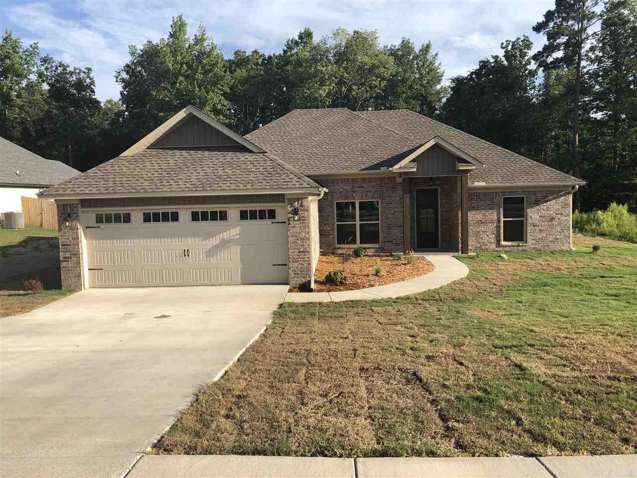 New construction home in Crossroads Village Subdivision. Split floor plan with formal dining room and fireplace in living area. Builder is installing blinds and is going to install privacy fence in backyard. Features covered back porch and large backyard. Harmony Grove School District. Qualifies for 100% Rural Dev. financing.
