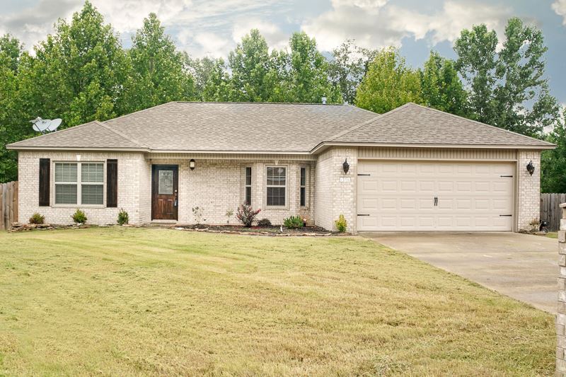 Great starter home located in a quiet cul-de-sac.  Cheaper than RENT!  All brick, 3 bedrooms/2baths, living room has vaulted ceiling, corner gas log fireplace and opens up to kitchen/dining combo.  Office with built in desk, refrigerator, washer and dryer will convey. Covered patio with deck and a private backyard.  Master bedroom has his/her closets, double vanities in master bathroom and spacious guest rooms.  This home qualifies for RD home loan.  Call today for more details.