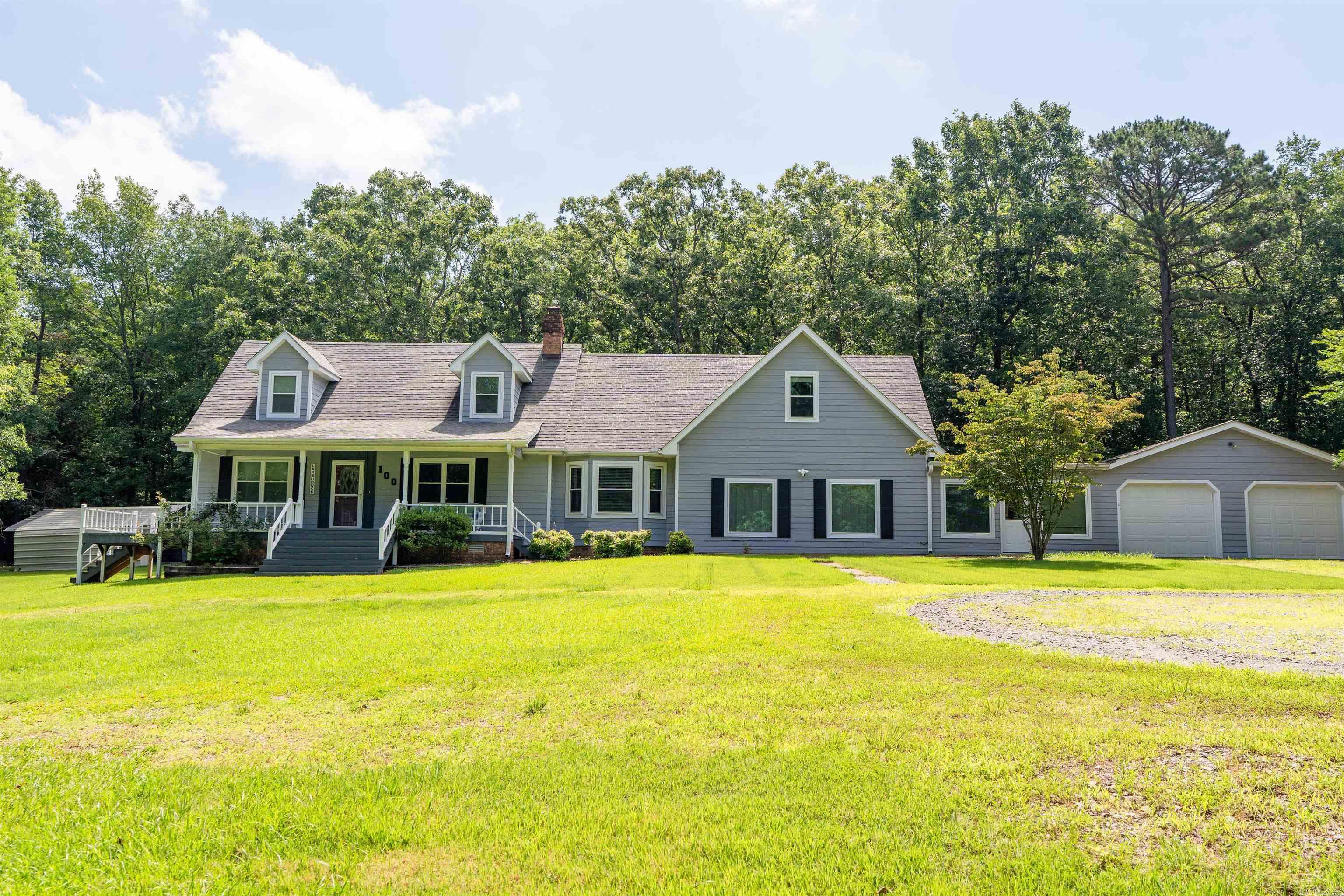 The perfect opportunity to own property only 2 miles from beautiful Greers Ferry Lake with privacy at the end of a dead-end lane. The circle drive makes it easy to maneuver all your lake toys.  Main floor master bedroom, two living areas, laundry and workshop.  Upper floor offers 3 guest bedrooms and two baths, sitting area that could be used as another bedroom. Sit outside on the front country porch or the nice screened in porch and enjoy a cup of coffee and watch the wildlife. 2 car garage with attached workshop.  Outdoors you will find a metal carport and basketball concrete area. Upstairs AC 5 yrs old. Screened porch roof replaced 3 years ago and roof between garage & house is new.  Don't miss out on this great full-time residence or lake home.