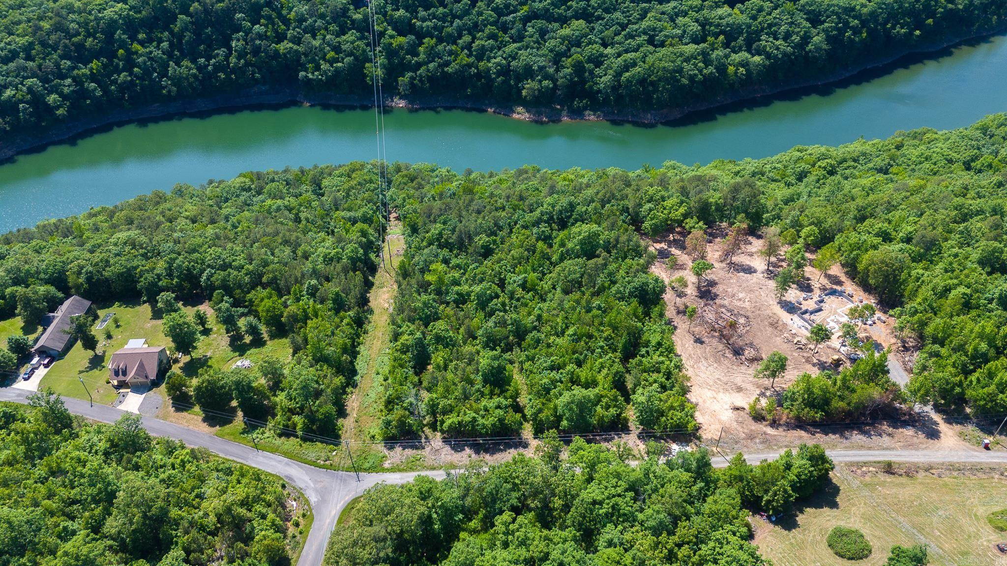 LIVE AT THE LAKE! Surround yourself with the BEAUTY of Greers Ferry Lake and build your DREAM HOME on this 1.60-acre lot! Conveniently located a short golfcart ride away from Hill Creek Marina, this property is SUN-SATIONAL! Excellent potential to develop OR build your own LAKE VIEW HIDE-A-WAY!