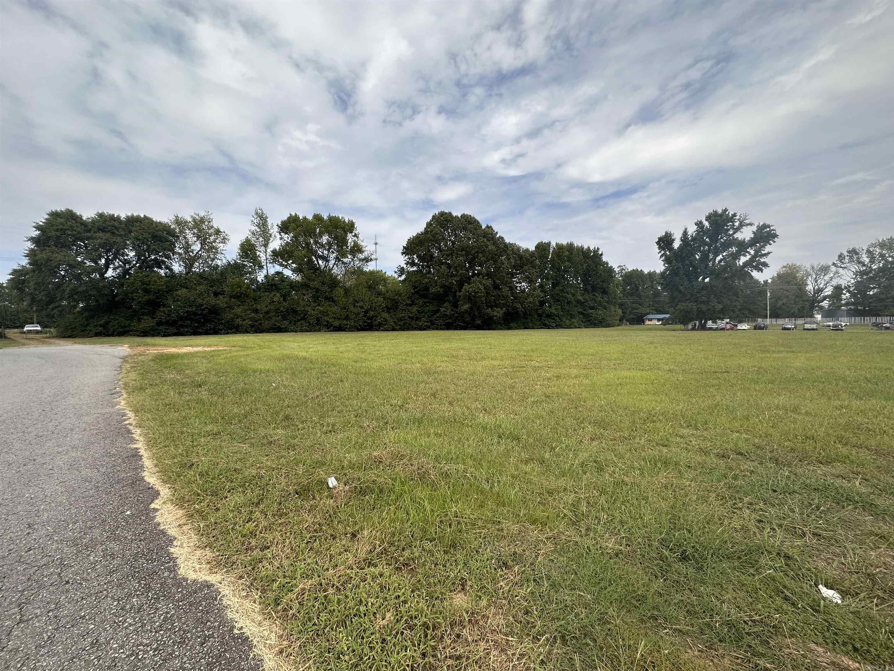 Commercial investment opportunity available in the heart of Beebe! This commercial lot has road frontage on McAfee Medical Circle, allowing any future business to easily be visible to traffic on DeWitt Henry Drive.