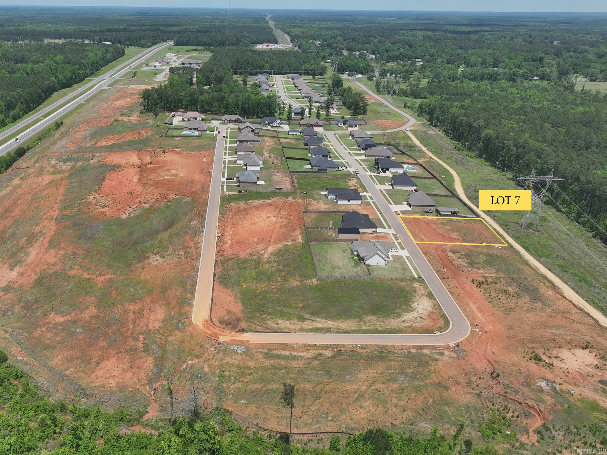 Build your future home in the peaceful Oak Tree South subdivision in Sheridan, Arkansas. Lot 7 offers a convenient location just minutes from Hwy 167, providing quick access to Sheridan, Little Rock, and surrounding areas while still enjoying a quiet residential setting. This homesite combines small-town comfort with easy access to shopping, dining, schools, and everyday amenities. Don’t miss this opportunity to own a residential lot in one of Sheridan’s growing areas.