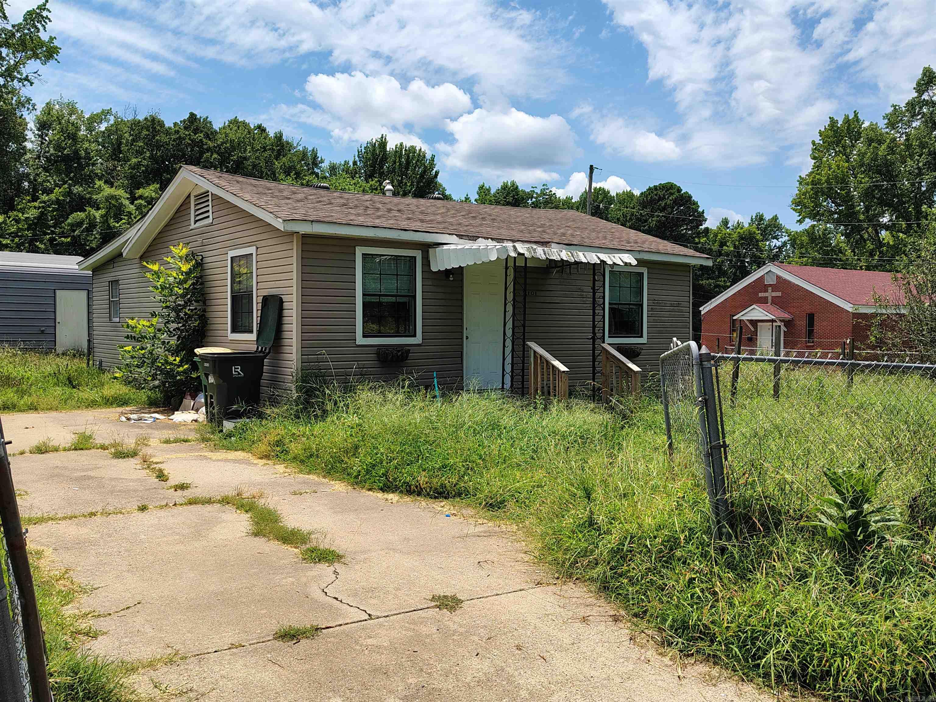 Great investment opportunity on corner lot, 3 bedroom 2 bath, HVAC a couple years old. Needs some TLC. Storage building on lot. No SPD available