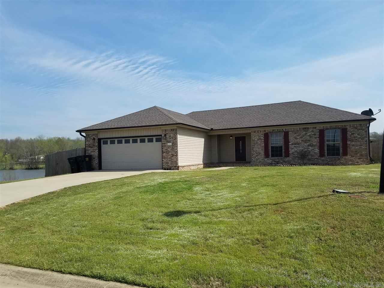 Great 4 bedrooms and 2 baths with an open concept and split floor plan. House set directly on Willow Lake.