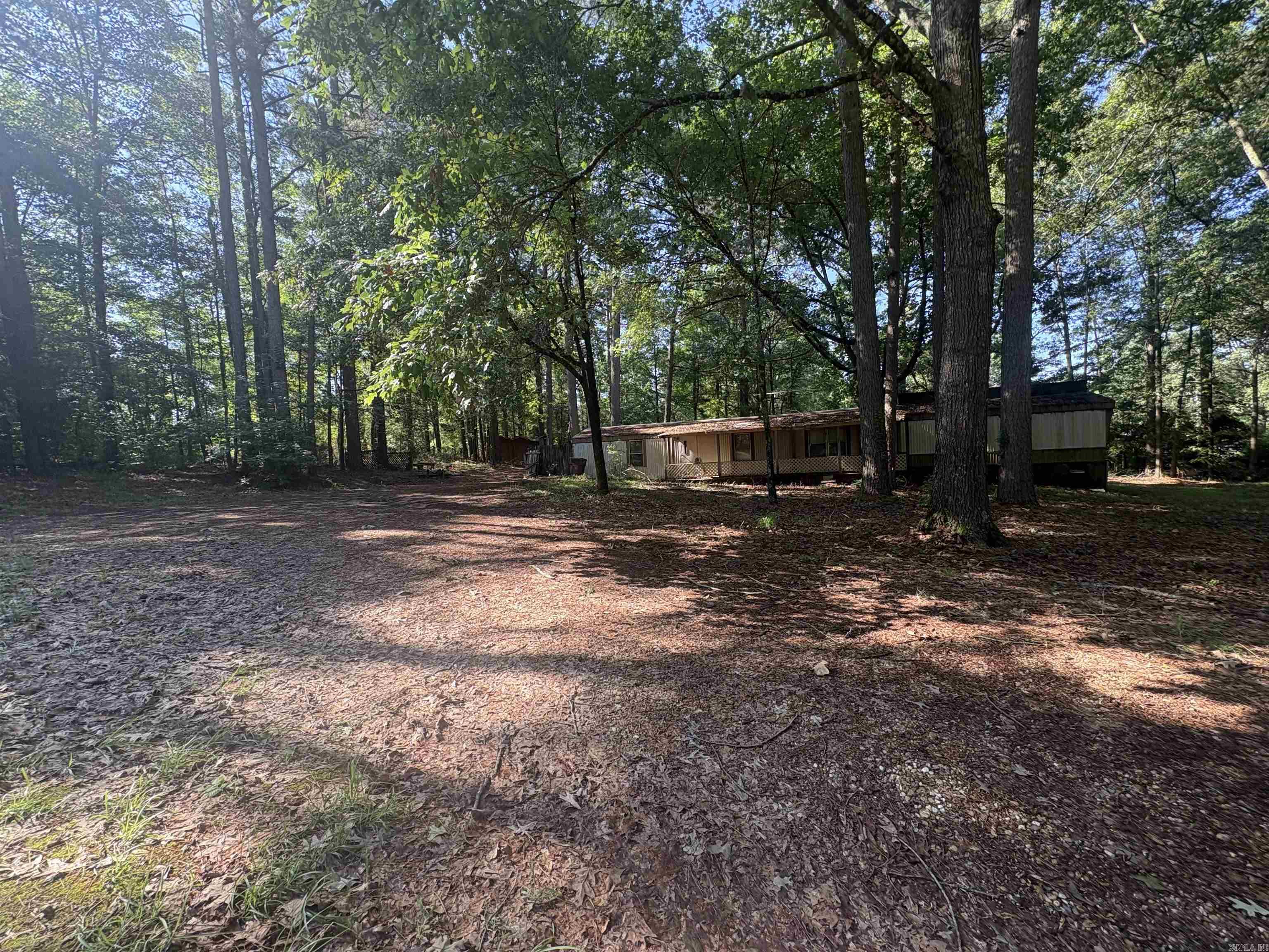 This listing contains two parcels. Parcel number- 01160-00022-0000 and Parcel number- 00000-17721-0001   This 3 bedroom 2 bath mobile home has lots of potential! It sits on a beautiful 2 acre lot in a lovely rural neighborhood.