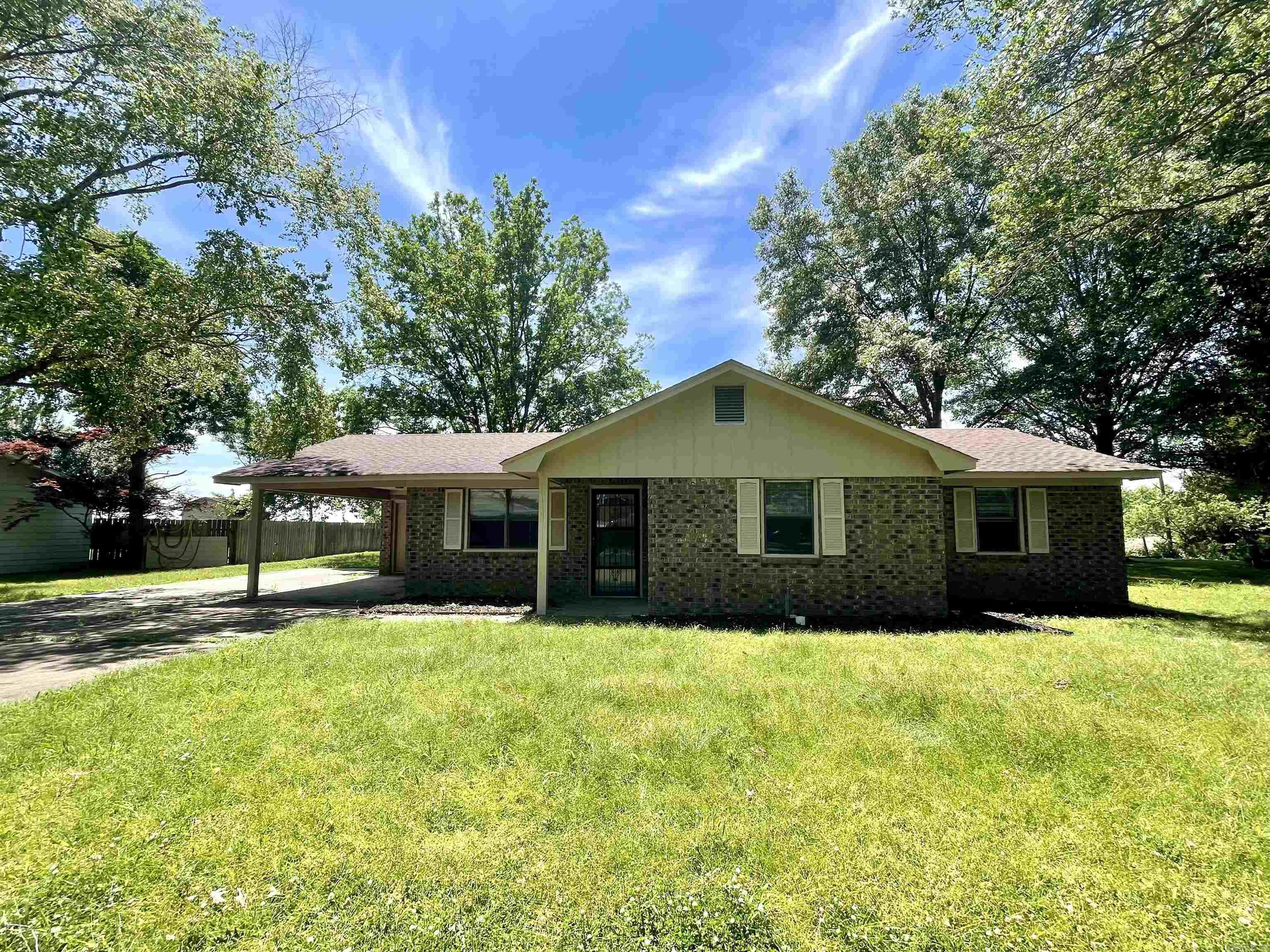 Welcome home to this beautifully updated 3-bedroom, 2-bath brick home offering comfort, charm, and plenty of outdoor enjoyment! Recent remodeling gives the interior a fresh, inviting feel, while the spacious screened-in porch creates the perfect spot to relax with morning coffee or unwind in the evenings. Situated on a lovely 0.21-acre lot with mature shade trees, the property provides a peaceful setting with room to enjoy the outdoors. Two backyard storage sheds offer excellent space for tools, hobbies, or seasonal items. Additional features include gas heat, a gas water heater, and a new refrigerator that stays with the home. This move-in ready property combines convenience, function, and cozy appeal all in one package!