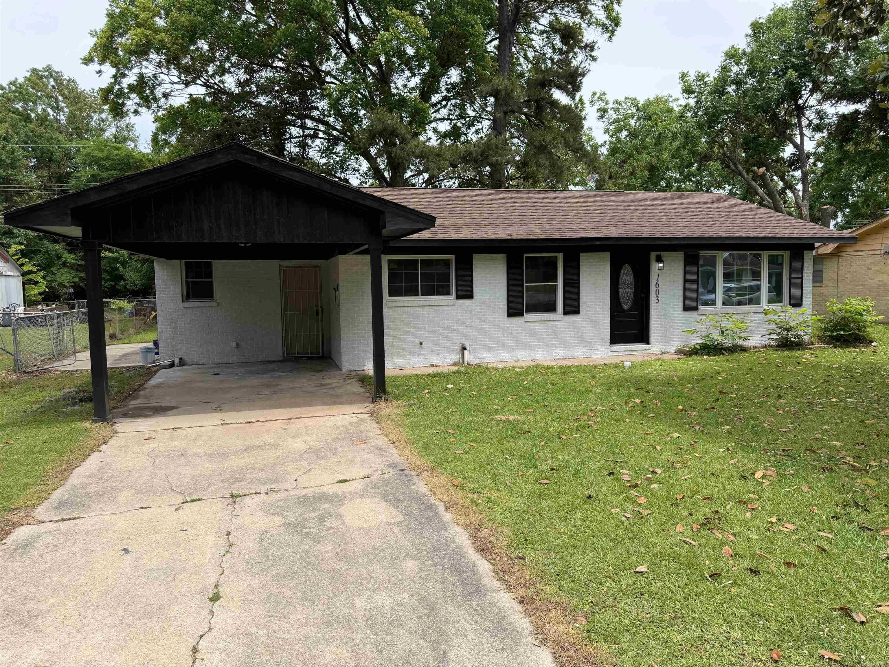 Completely rebuilt from the studs, this stunning move-in ready home is loaded with upgrades including a new roof, windows, HVAC system, ductwork, hot water heater, plumbing, and electrical. Inside, you’ll find luxury vinyl plank flooring, recessed lighting, spacious bedrooms, and designer finishes throughout. The show-stopping kitchen features sleek black cabinetry, butcher block countertops, gold accents, updated appliances, and an oversized workstation sink. The spa-inspired bathroom adds the perfect finishing touch with floor-to-ceiling tile and modern fixtures. Stylish, modern, and practically brand new — this home is a must-see!