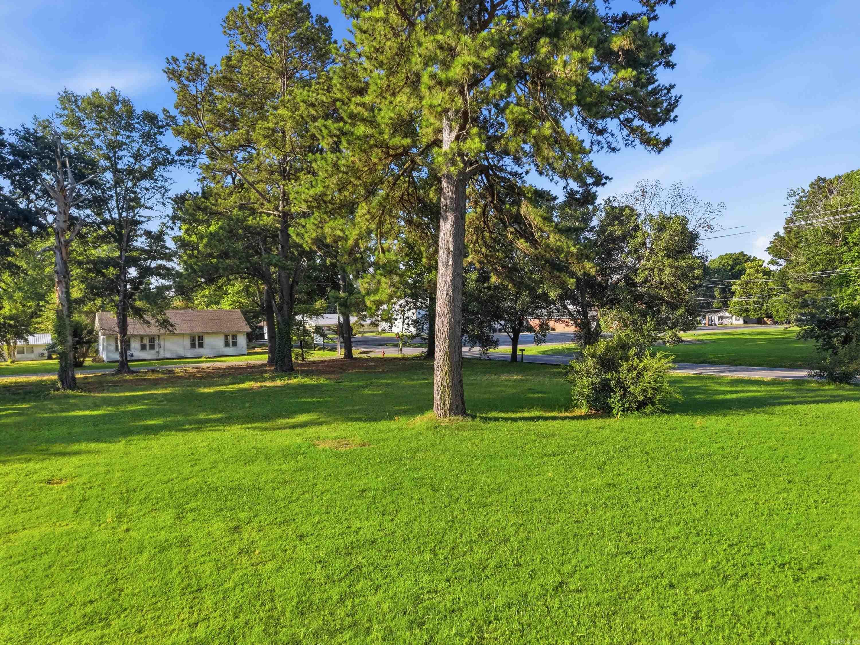 Beautiful level, partially cleared 0.75 acre lot perfect for a single family residence or another multi-family investment property in the heart of Ward.