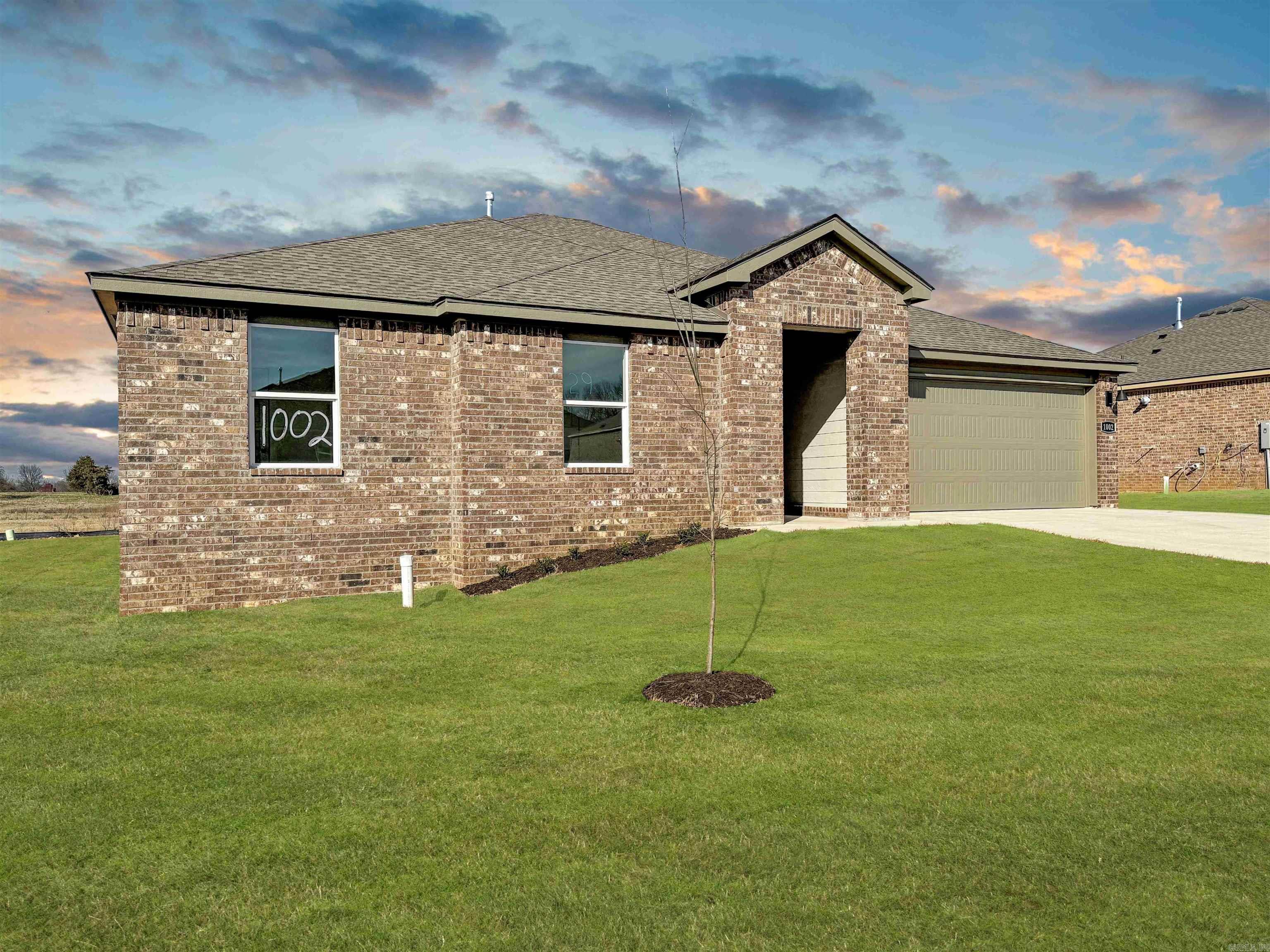 Charming Coleman plan in Wolfsbridge at Cabot, located in Cabot, Arkansas! These new construction homes feature modern finishes for comfortable living! Each home has LVP flooring and carpet.  In the kitchen and bathrooms, you’ll find beautiful quartz countertops. The primary bathroom features a walk-in shower and a quartz vanity!  Each home will have 4-sides brick with Hardie® siding per plan. These homes come with a programmable thermostat! 10-year limited Homebuyer’s Warranty! Photos may be stock photos, representative of plan only and may vary as built. Annual taxes is an estimate.  HOA is $375 with a $75 Transfer fee.