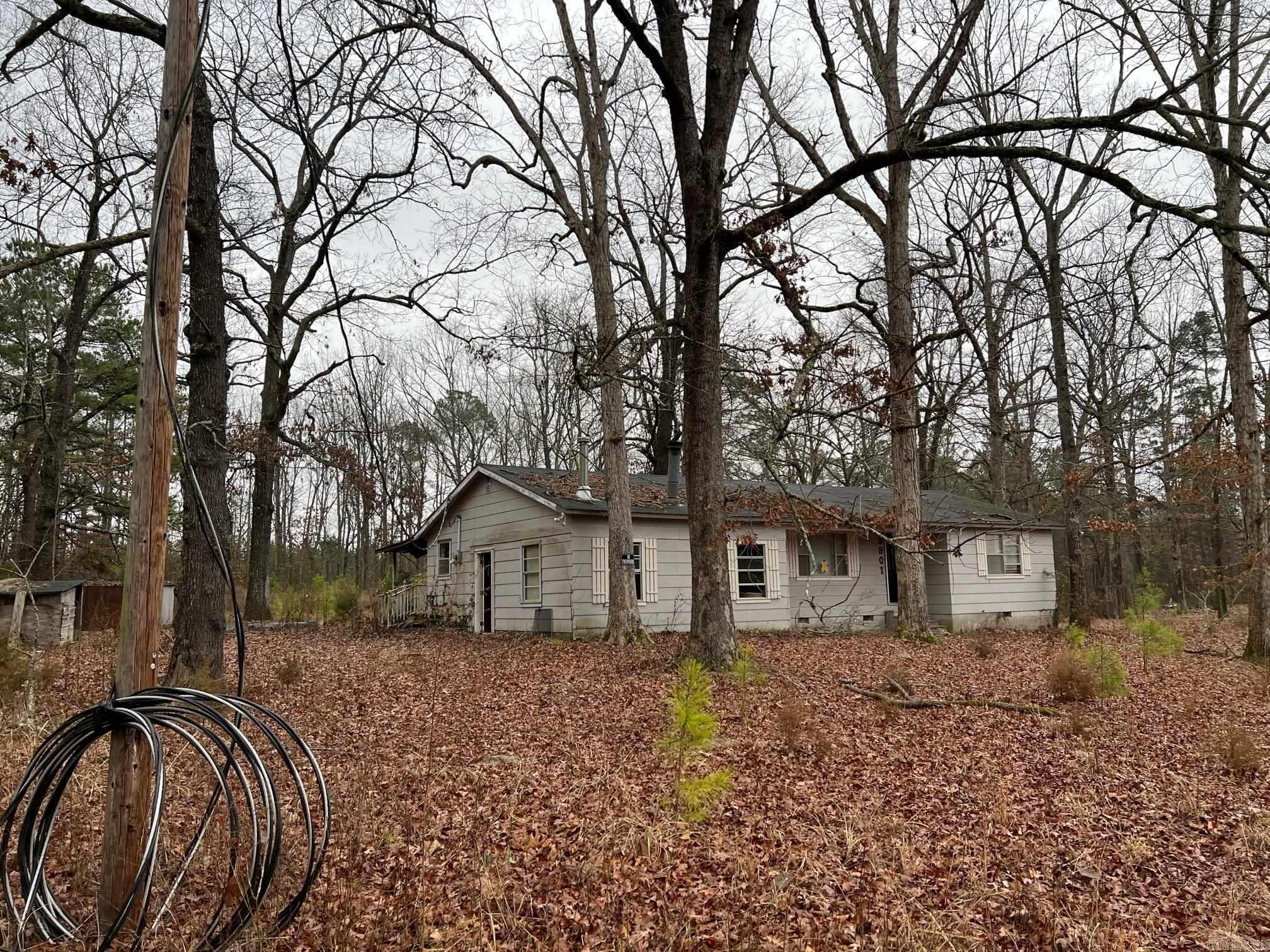 Fixer Upper House on 4.7 acres. Nice country setting Owner Will Finance this property