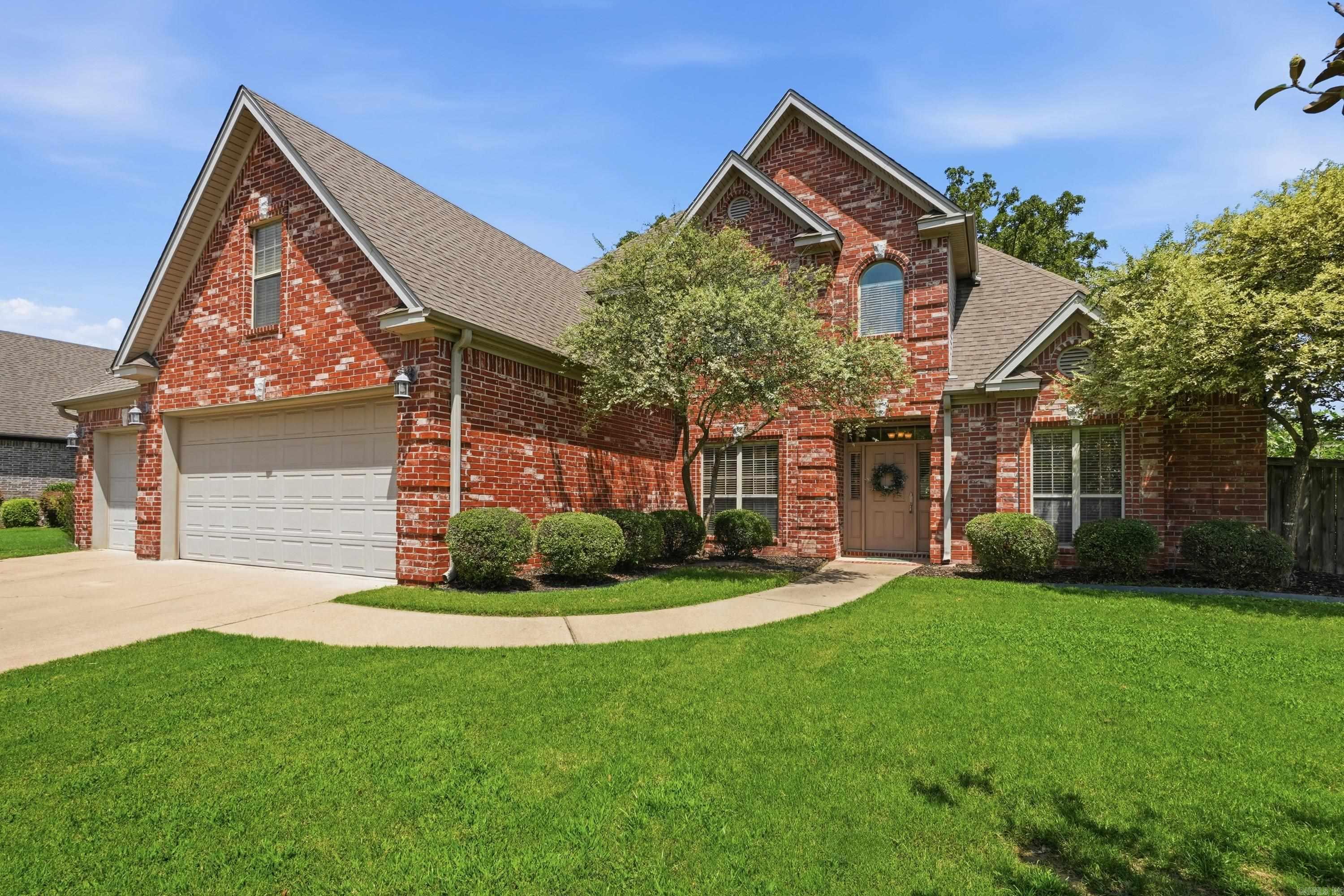 Well-maintained 4 Bedroom, 3 bath home with golf course frontage and a huge bonus room. Enjoy the covered patio overlooking a private, tree-lined backyard lot that extends beyond the existing iron fence. The main level features a very spacious primary suite with double vanities, jetted tub, separate shower, and walk-in closet, plus a guest bedroom and full bath. Upstairs offers 2 large bedrooms, and a shared full bath with separate vanity areas, and an oversized bonus room that could serve as a 5th bedroom, playroom, or media room. This home offers abundant closet space, a large great room with high ceilings, and a spacious kitchen with ample cabinet space, large walk-in pantry, dining room, and 2 fireplaces, one in kitchen/hearth area and one in the great room. Additional features include a generator, 3 car garage. New Hardwood flooring in great room and dining room. HVAC 2 years old. Seller is providing buyer with a 1 year Choice home warranty.