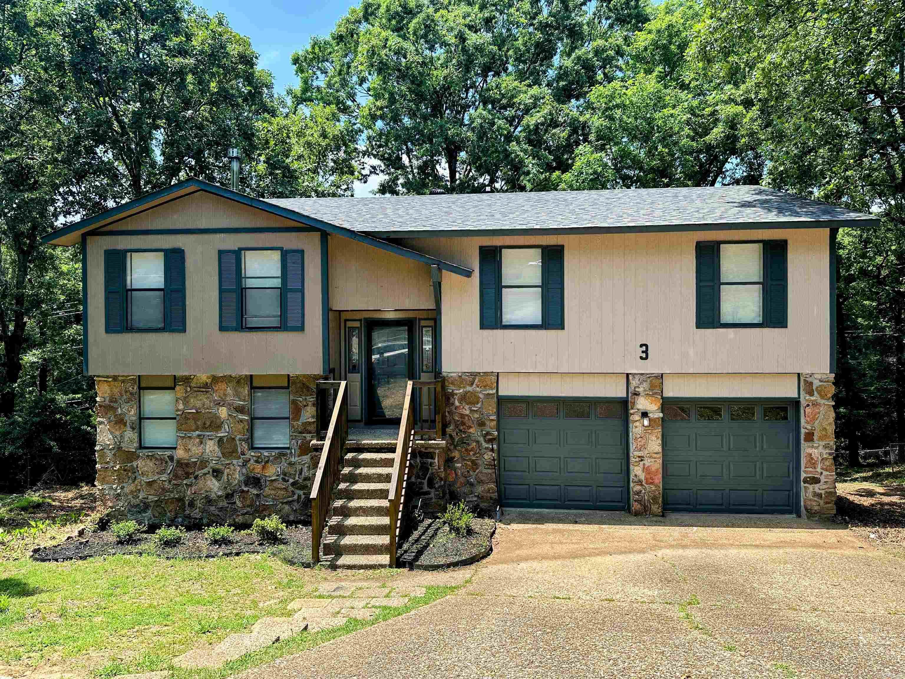Completely refreshed 4 bedroom home with 3 full baths on a massive lot! New Roof! 3 bedrooms 2 bathrooms upstairs with full dining, kitchen and living room. Downstairs has a mother in laws suite, bedroom with full bath, living area with a fire place and wet bar. Double decks overlook the huge backyard backed up to green space.