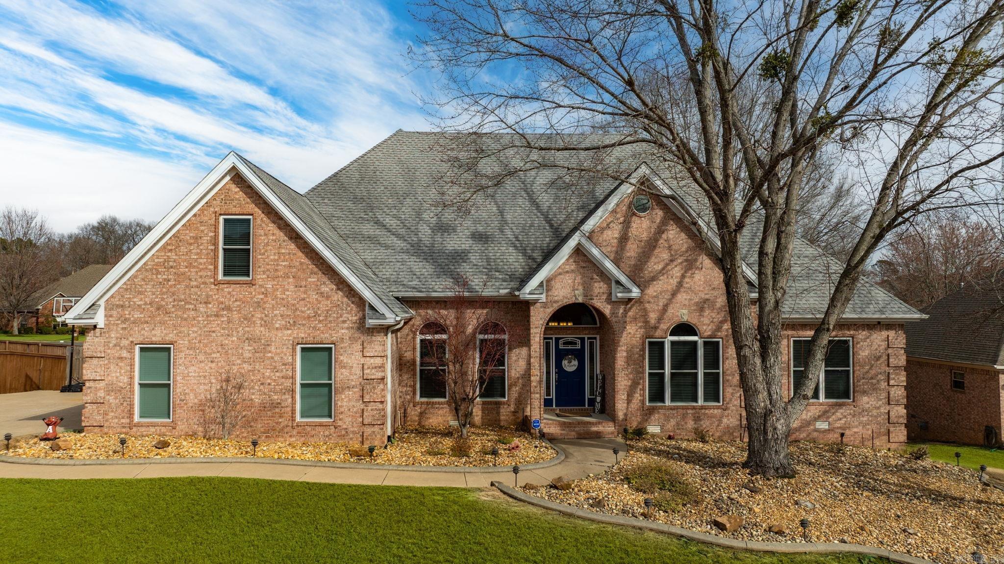 Beautiful home in highly sought-after Osage Falls Estates. Designed for effortless one-level living, the main floor features four bedrooms and two full baths. The primary suite stands apart with a spa-like bath, separate vanities, a walk-in shower, and an impressive walk-in closet. The heart of the home is a spacious living room with a double fireplace, opening to a gourmet chef’s kitchen equipped with stainless steel appliances, a electric cooktop, and a bright breakfast area. The upper level offers exceptional flexibility with its own living room, media room with dry bar, and dining space. A sep second bonus room can serve as a fifth bedroom, accompanied by a full bath—ideal for guests or an in-law suite. Additional space includes an 826 SF concrete walk-in basement, perfect for a workshop, gym, or storage. Off the main level, a covered and screened-in outdoor area provides an inviting additional living and dining space. Recent upgrades include new LVP flooring, granite countertops, fresh paint, updated hardware, and new light fixtures. Side entrance garage and large drive w/dbl fence to large backyard perfect for entertaining.  This is a must see!