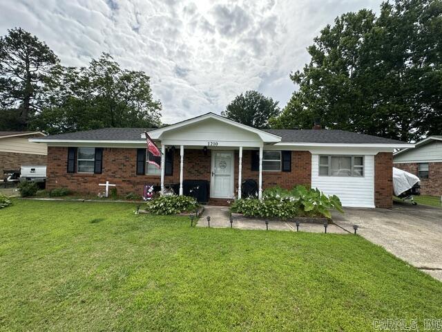 Charming home in the heart of Lonoke! This well-maintained brick home offers 4 bedrooms, 1.5 baths, and approximately 1,400 sq ft of comfortable living space. Enjoy a spacious living room, a large laundry room and a versatile 4th bedroom featuring a wbfp ~ perfect for a home office, craft room, den or guest space. Step outside to a fenced backyard with plenty of room to play or entertain, a patio for grilling and relaxing, and a storage building for all your extras. Don't miss this wonderful opportunity ~ call today to see this one!!