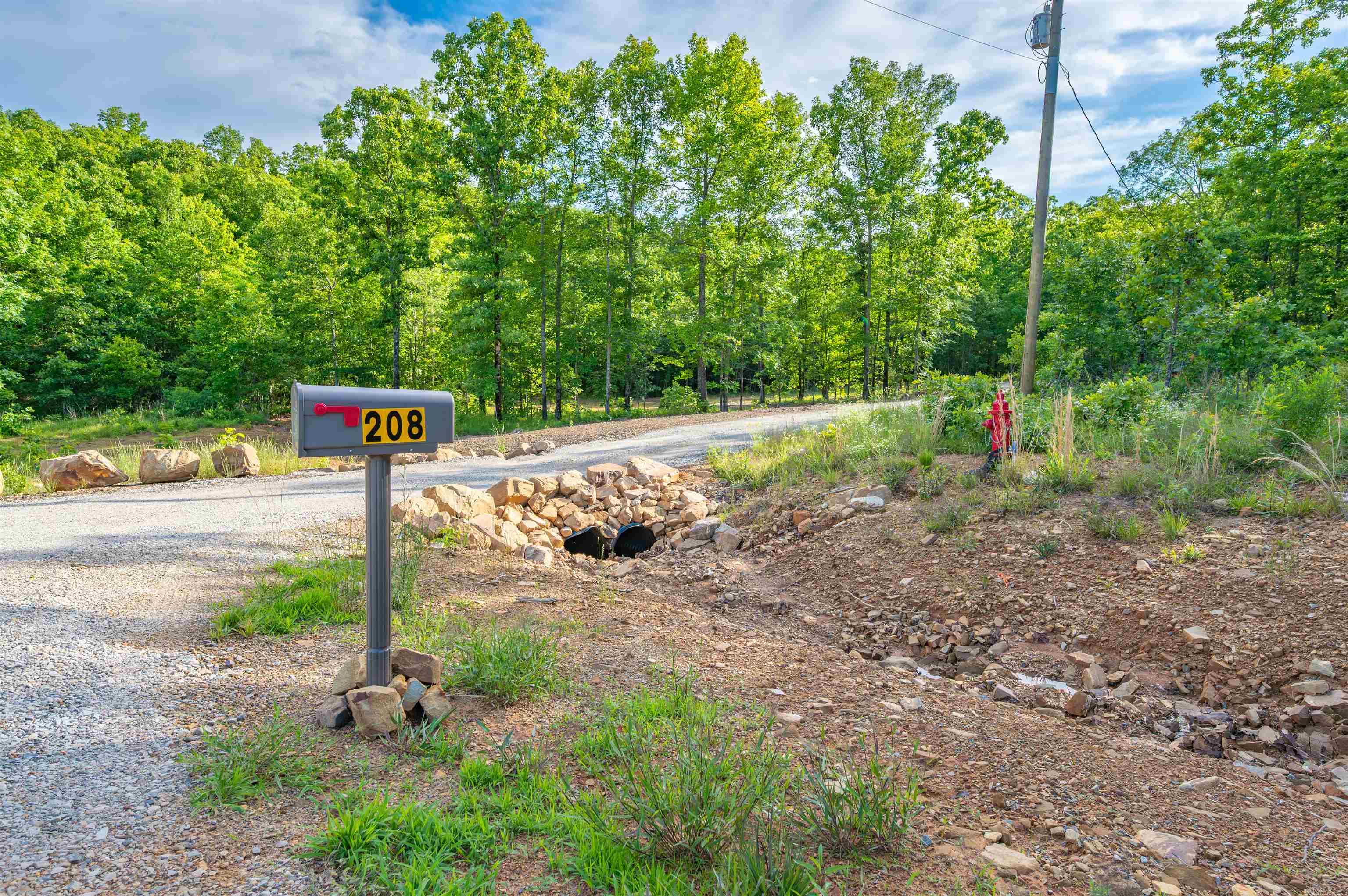 This is the Perfect Wooded 3 Acres to build your homestead. This property has water, electric and new septic ready to build your forever home. Property has a 12x24 shed that needs finished on the inside. This 3 acre lot is located at the end of the cul-de-sac, provides you with plenty of room for garden, animals and buid your forever home. Mobile Homes allowed but needs to be 5 years or newer, Barndominium allowed, tiny homes allowed - See agent remarks
