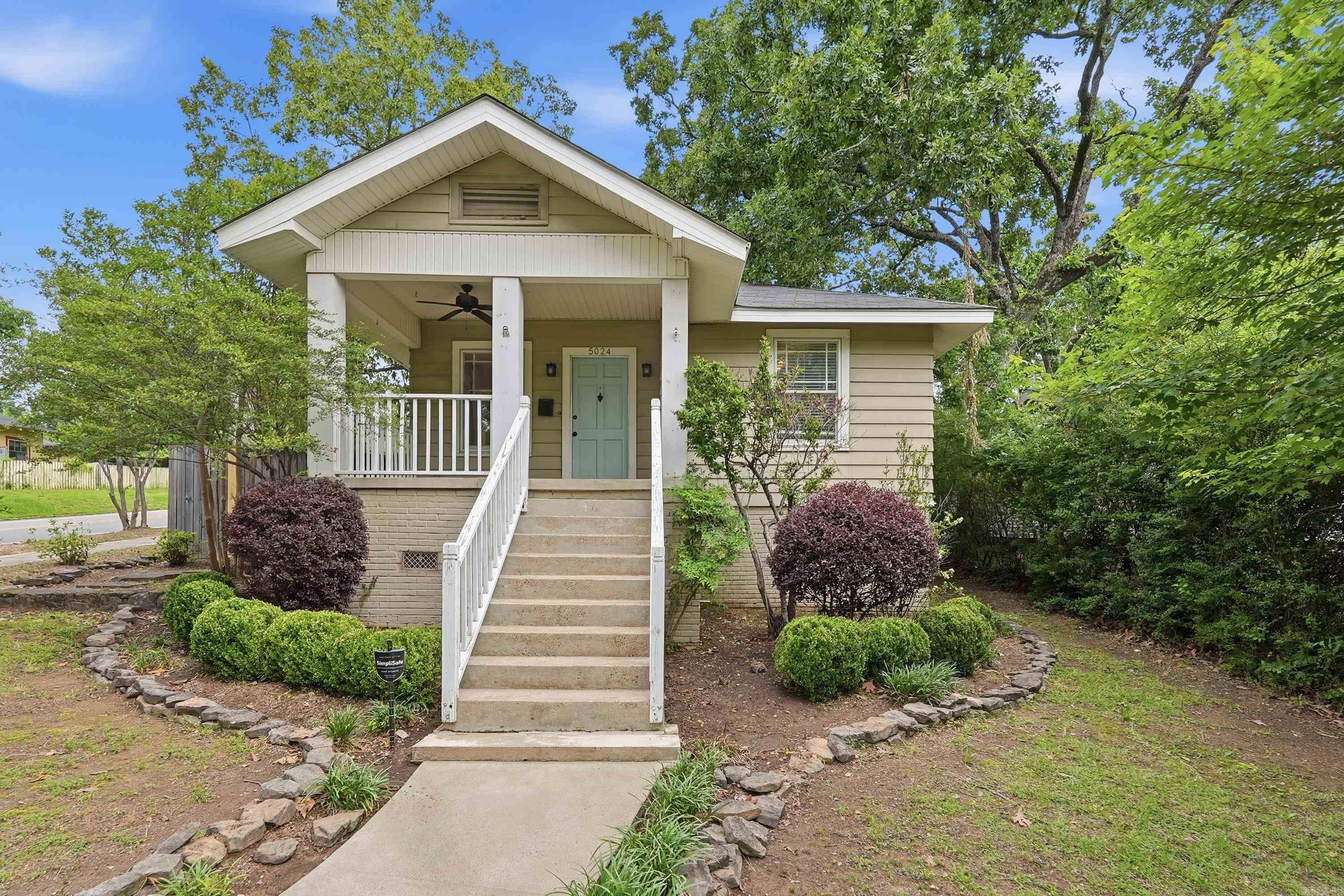 Charming Hillcrest traditional bungalow — 3 beds, 2 baths. Well-maintained with original hardwood floors throughout and a spacious kitchen ideal for everyday cooking and entertaining. Both bathrooms have been updated. Refrigerator and washer/dryer convey with the home. One-car garage with automatic opener plus two additional parking pads with alley access. Conveniently located close to Hillcrest shopping and restaurants, downtown, the interstate, and nearby hospitals. Comfortable, move-in ready home in a prime location. School information based on tax records.