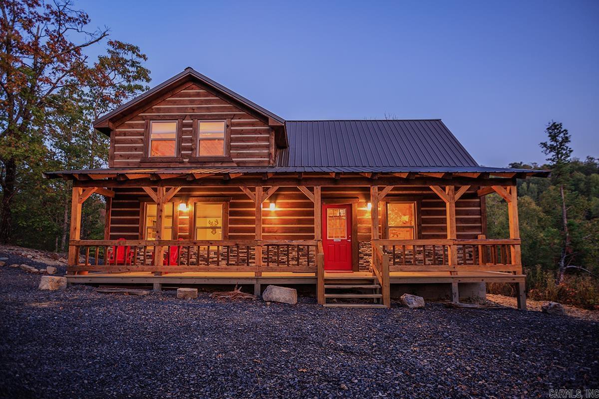 Escape to the Ouachita Mountains in this 3 br, 2 ba Hideway cabin, nestled on approximately 9.3 acres. The exterior of the cabin has a new coat of stain. Enjoy stunning views, ATV trails, and swimming holes that are minutes away.  Sit on the front porch and enjoy the beautiful outdoors in a very private setting. This cabin has a year-round creek and a National Forest Boundary. The hideaway cabin is fully furnished and is a turn-key vacation rental that has been operating for 7 years. Or, you can make this your private residence to escape into the woods. Don't miss out on this opportunity to buy a slice of the Ouachitas! Also potential to purchase with an additional cabin and more acreage!