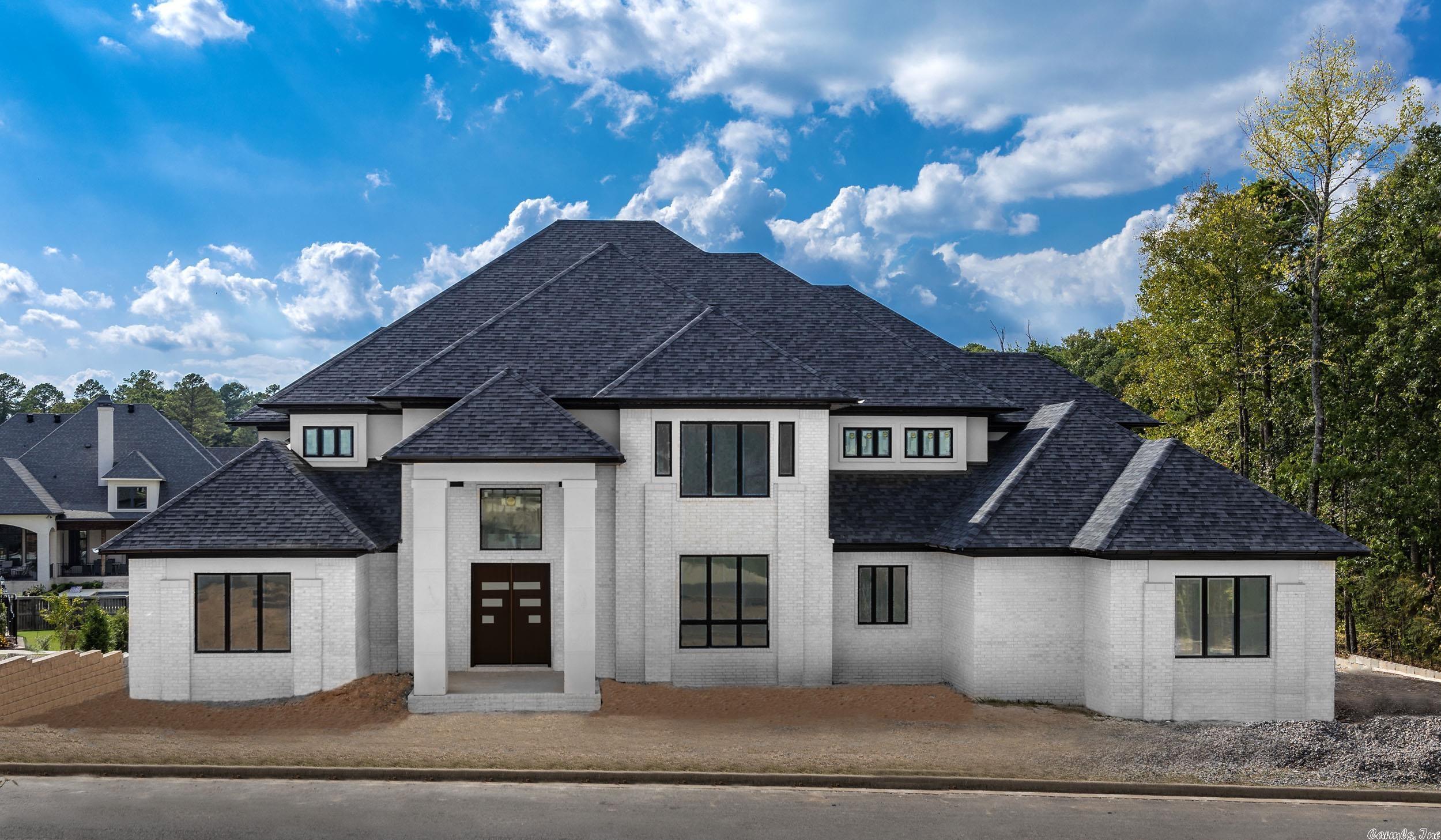 Amazing new construction in Chenal Valley. Beautiful home under construction in the gated private Orle neighborhood. Primary Suite plus 4 additional bedrooms ensuite. Open and modern plan with outstanding finishes. Floating staircase plus back staircase. Fireplace in Great Room with built ins. Kitchen with island and wet bar.  Gorgeous white oak cabinets throughout. Additional rooms include an Office, Media Room, Bonus Room and Mud Room.