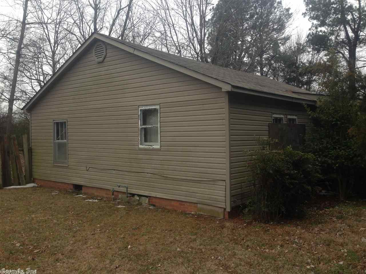 Three bedrooms, two full baths. Kitchen dinning room combo. Large back yard. Fully fenced. Needs work. No a/c but has furnace. Furnace approx. 10 years old. Roof approx. 15 years old. No stove. Sold AS IS.