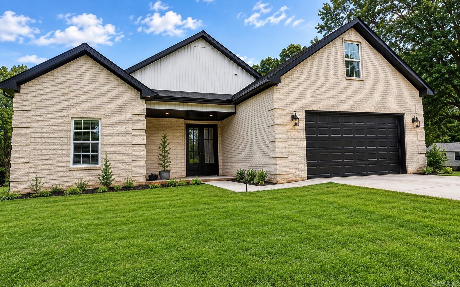 Welcome to this stunning 4-bedroom, 2-bath home offering the perfect blend of style, comfort, and functionality. From the moment you step inside, you'll be greeted by gorgeous polished tile flooring that flows seamlessly throughout the home, creating a bright, sophisticated look with easy maintenance. The spacious open-concept layout is enhanced by designer lighting, sleek black fixtures, and modern hardware that add a touch of contemporary elegance to every room. The well-appointed kitchen opens effortlessly to the living and dining areas, making it ideal for entertaining family and friends.The private primary suite offers a relaxing retreat, while three additional bedrooms provide plenty of space for family, guests, or a home office. A spacious 2-car garage adds convenience and extra storage. Located in one of Jonesboro's desirable neighborhoods, this move-in ready home combines timeless finishes with modern appeal. Don't miss your opportunity to make this beautiful property your next home!
