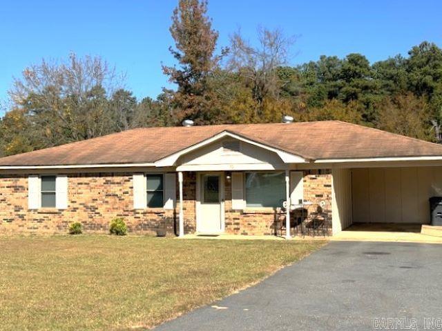 This well maintained 3 bedroom, 1 bath, 1092sf home sets on .48ac corner lot in close proximity to downtown Rison and Rison Schools.  A first time homebuyer's dream, this home includes new electric stove & dishwasher, 40 gallon electric water heater, & 2 nice storage buildings in the fenced backyard.  Refrigerator, washer & dryer will also convey. Seller is willing to negotiate on furnishings left at the house. Primary bedroom has a mounted television that will also convey.  All electric, but a gas space heater is included and is fueled by a small propane tank if your electricity goes out on the upcoming winter months. A single carport plus a detached portable carport complete with gravel for covered parking. Bedrooms are carpeted, with vinyl in bathroom and laundry room and laminate everywhere else.  This is a very pleasant drive from Monticello, Warren & Pine Bluff especially now with the changing leaves.  Make an appointment today to see this home.