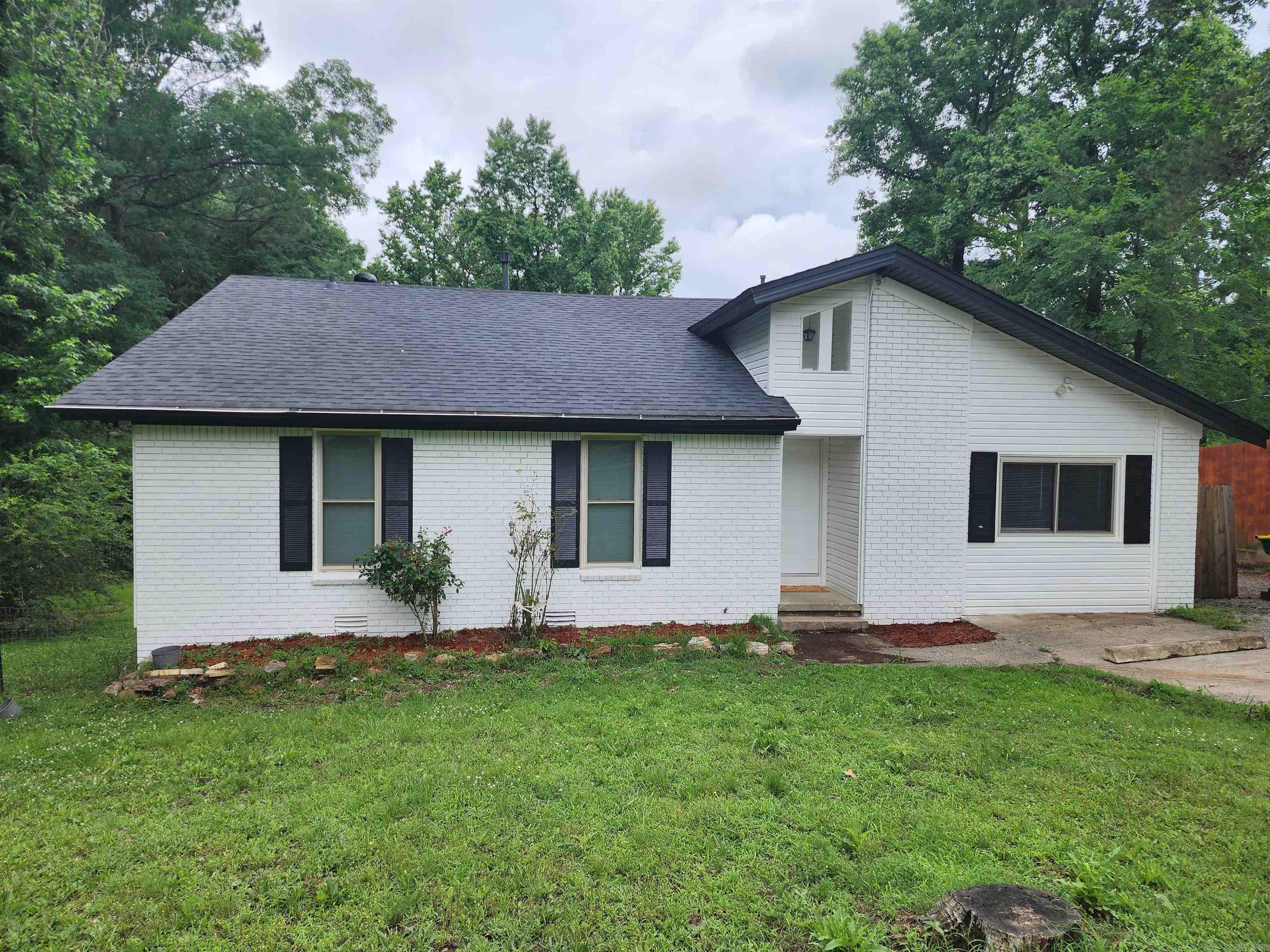 Welcome home to 12820 Ironton Cutoff Rd in Little Rock's Archwood Manor.  Sitting on almost half an acre, this updated home provides a quiet and peaceful location, yet only minutes away from all Little Rock amenities.  Updates include new paint, new flooring, new plumbing and lighting fixtures, updated kitchen (stainless steel gas range), new cabinets, and bathrooms, granite countertops and much more. Roof 2026. This property is eligible for 100% financing with USDA Rural Development (RD).  Beautiful vaulted ceiling with wood beams!  Check out the HUGE pantry!  See agent and showing remarks.