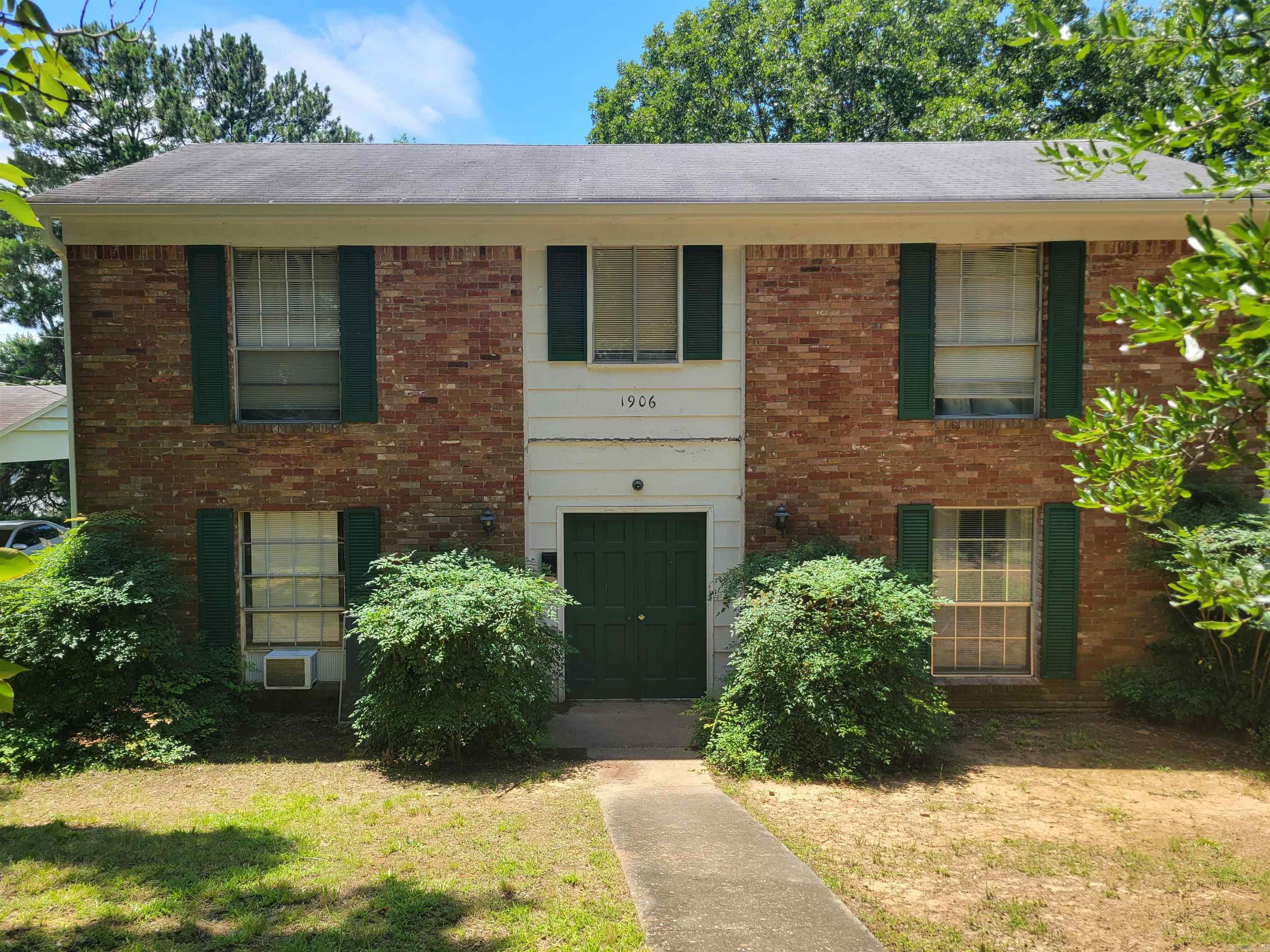 Investor opportunity in the heart of West Little Rock! This well-maintained duplex at 1906 Brownwood Dr offers two 2-bedroom, 1-bath units with strong rental history and stable income. Both units are currently occupied, generating $1,850 per month ($22,200 annually) in gross rental income. One lease expires June 2026, while the other runs through January 2027, providing immediate cash flow with future flexibility for rent adjustments. Tenants pay all utilities, helping keep operating expenses low and maximizing investor returns. Each unit features functional layouts and convenient rear carport parking. Located in the highly desirable 72207 area, this property is just minutes from Park Plaza Mall, UAMS, Baptist Health Medical Center, University of Arkansas at Little Rock, restaurants, shopping, parks, and major employment centers. The central location continues to attract long-term tenants seeking convenience and accessibility. Whether you're looking to expand your portfolio, complete a 1031 exchange, or acquire a low-maintenance investment in a strong rental market, this duplex offers consistent income, tenant-paid utilities, and excellent long-term appreciation potential.