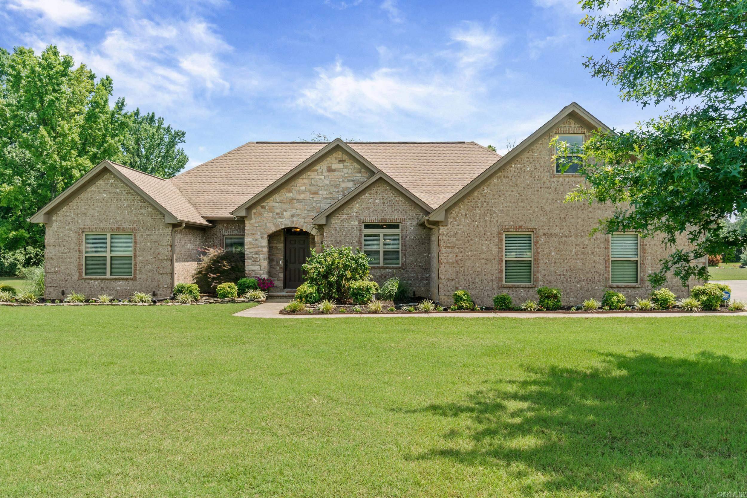 Charming country home on 2.27 acres just outside city limits. This property offers the breathing room you’ve been looking for with plenty of space for play, pets, gardens, or future outbuildings.  Open living area with durable concrete floors for easy maintenance and a modern, clean look. Separate bedroom plan provides privacy, with the primary suite set apart from secondary bedrooms. Versatile bonus room ideal for a media room, home office, playroom, or guest space. Room to expand: ample acreage and a flexible layout make future additions or outdoor projects straightforward. Out-of-city setting delivers a quieter lifestyle while keeping everyday conveniences within a short drive. A great fit for families needing extra elbow room, hobbyists wanting workspace, or anyone who values space and flexibility. AI Generated Photo