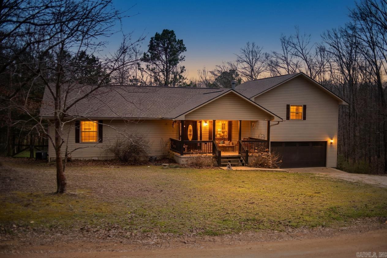 Now offered under $300k! Spacious 3 bed, 3 bath home with 2,200+ sqft tucked into the peaceful Ozark hills just minutes from downtown Mountain View. This home sits on approximately 0.64 acres and offers the perfect blend of privacy, comfort, and small-town charm.  Inside, the home features 2,266 square feet of living space with warm wood flooring, a cozy wood-burning stove, and a layout designed for both everyday living and entertaining. The spacious vaulted master suite feels like its own private retreat, complete with a balcony perfect for morning coffee, a relaxing soaker tub, tiled walk-in shower, and a generous walk-in closet.    On the lower level, a bright sunroom filled with natural light offers endless possibilities — whether you need a home office, or a hobby room. Step outside to enjoy the large deck overlooking the fenced backyard and surrounding Ozark scenery, creating the ideal space for grilling, relaxing, or letting pets roam.    Major updates bring peace of mind, including a roof replaced about two years ago, two water heaters, and two HVAC units with one recently replaced.