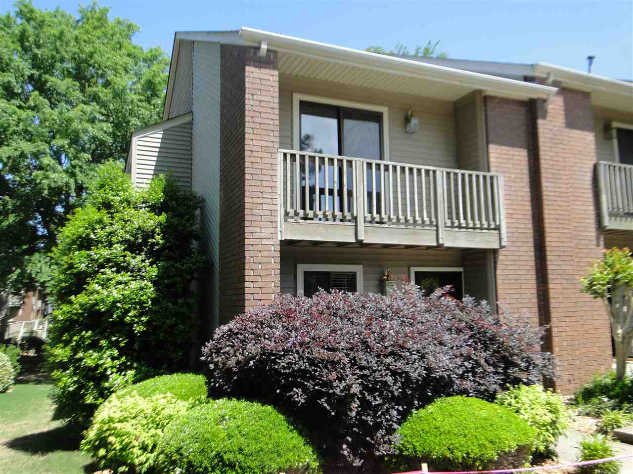 Convenient location.  Just off Cantrell and Foxcroft. This  well maintained condo is move in ready. Kitchen is complete with built in microwave, smooth top electric range, dishwasher and tile flooring, counters and backsplash. In the spacious living and dining combination is a gas log fireplace, built in media cabinet and wet bar. Upstairs are two bedrooms and two baths.  You can relax on your covered deck or upstairs balcony and enjoy the view of the pool. End Unit. County data shows     1631 sf.