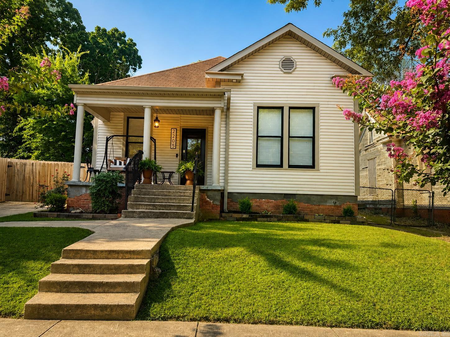 This exceptional one-level home has undergone a stunning historic restoration seamlessly blending modern luxury with the timeless charm of its 1910 heritage. Featuring all-new electrical, plumbing, & major systems, this move-in-ready residence offers 3 bedrooms, 2 full baths, soaring 11-foot ceilings with elegant transom doorways that preserve its historic character. The beautifully designed kitchen combines contemporary finishes with period-inspired details creating a warm and inviting space that's perfect for everyday living and entertaining. Outside, you'll find ample off-street parking accessible through a wood privacy fence, providing both convenience and security. Lovingly restored in accordance with the National Park Service's Historic Preservation Guidelines, this home is located in the heart of a significant historic neighborhood. It's just a short walk to The Little Rock Central High School National Historic Site Visitors Center & Museum, Little Rock Central High School, & the Memorial Garden. This remarkable location offers the opportunity to live near one of America's most important civil rights landmarks, where the Little Rock Nine made history. See agent remarks