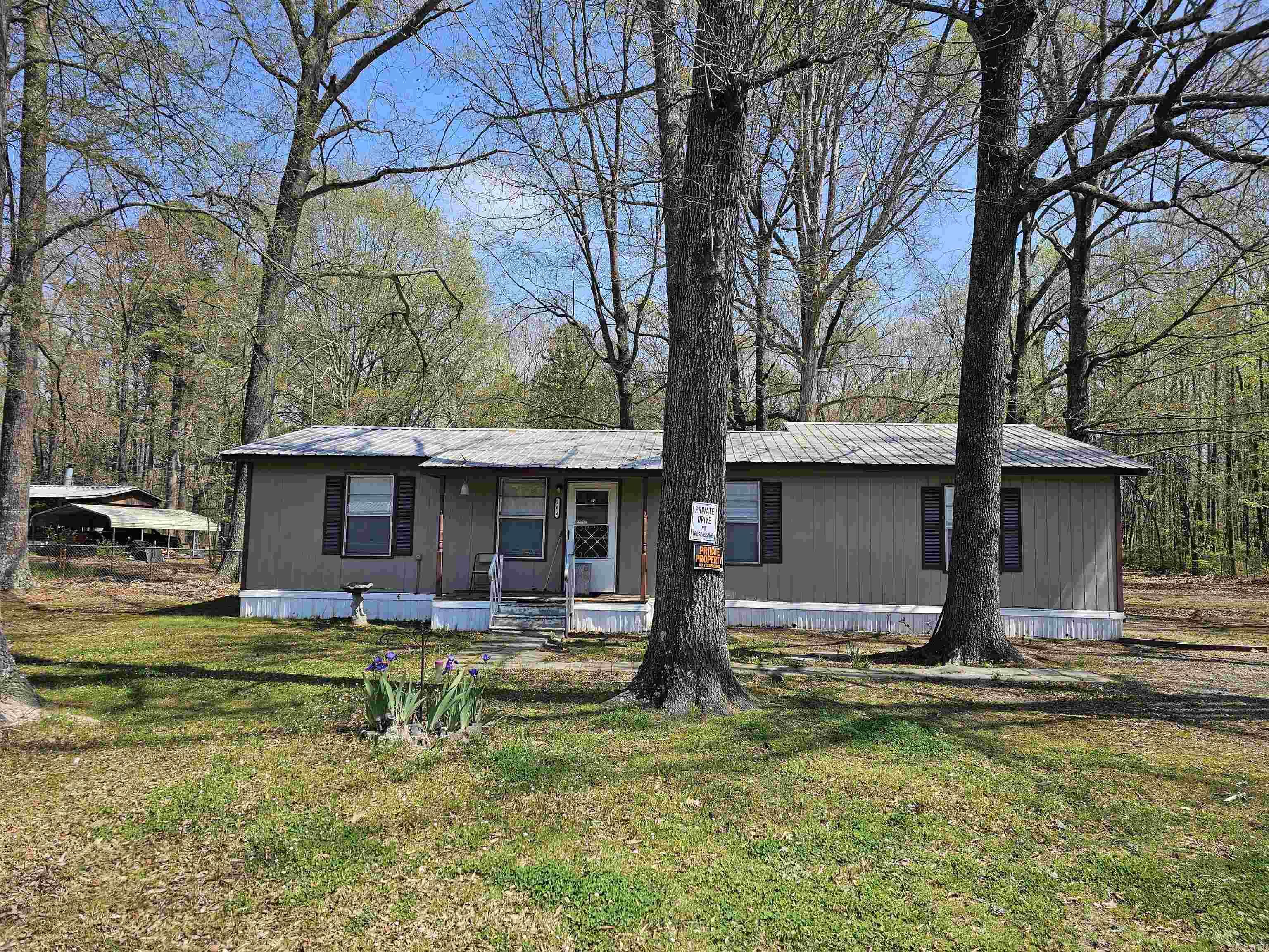 Great opportunity for investors or buyers looking to add their personal touch! This 3 bedroom, 1 bath home is being sold "as-is" and offers potential for a second bathroom.  Recent updates include a new heat pump and updated plumbing.    Situated on a spacious 1 acre lot with an outbuilding, there is plenty of room for storage or hobbies.  Please note: the home will require repairs, including flooring--3 rooms are currently down to subfloor and the flooring throughout is uneven.  With some work, this property could be a great investment or project home!